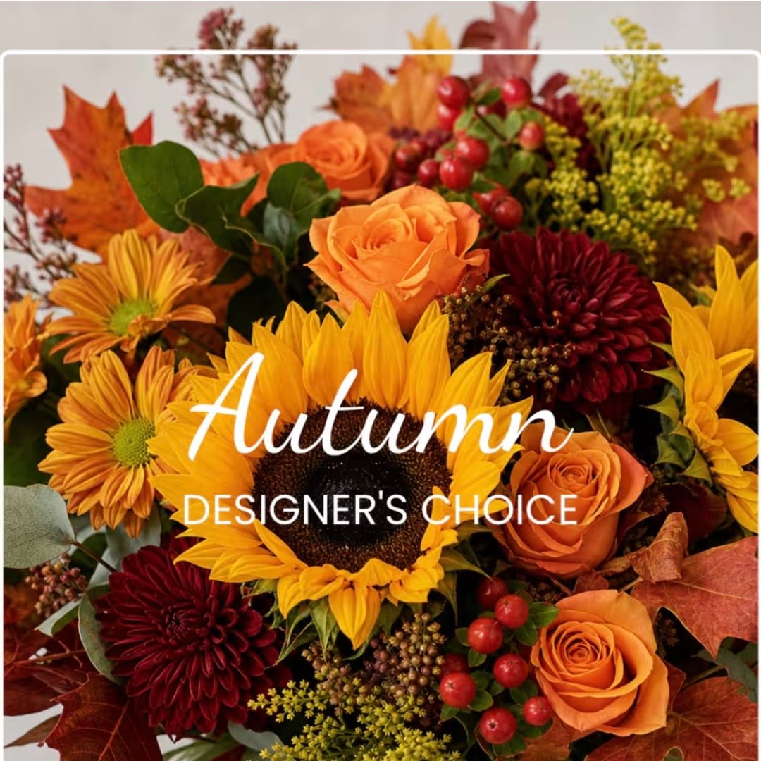 Autumn bouquet with orange roses, sunflowers, and burgundy mums