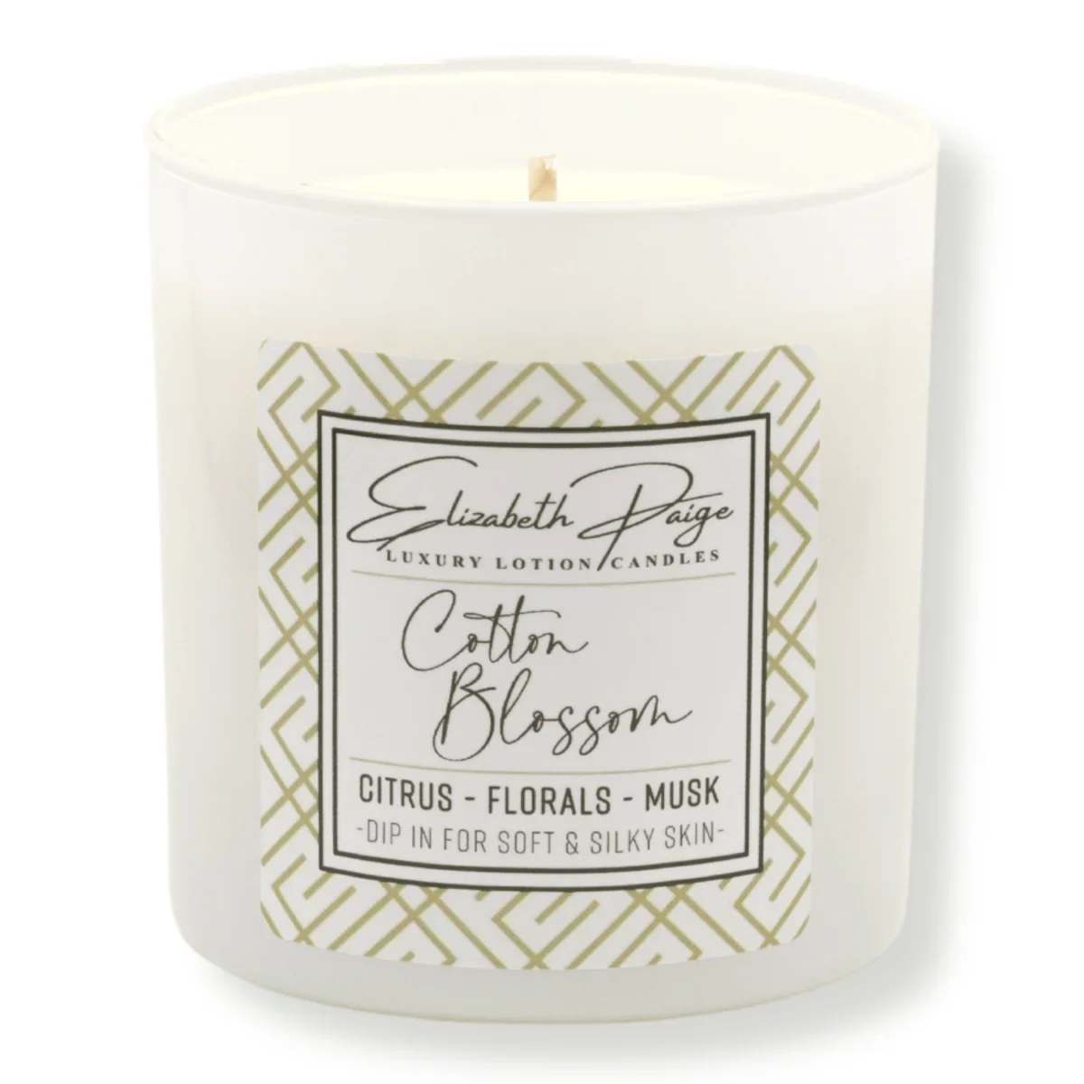 Cotton Blossom Soy Lotion Candle - Citrus – Florals - Musk  Capture the nostalgic aroma of line-dried sheets on a sunny, breezy day. This scent begins with calming cotton blossom and a touch of citrus, giving way to a heart of crisp linen. Base notes of musk and sandalwood ground this clean, classic fragrance.   9oz | Approx 40 hr burn time  100% Pure Soy Bean Oil   Enjoy your favorite fragrance and beautiful ambiance WITHOUT black soot and smoke (just keep those wicks trimmed!)  Made without dyes, additives, petroleum, or paraffin AND hand-poured with love in the USA.  But the fun doesn't stop there! The best (and most unique) part is ... our candles DOUBLE AS LOTION.