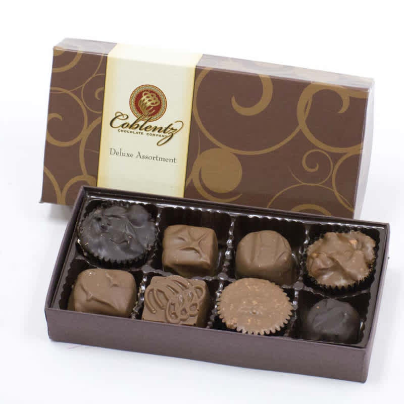 Box of assorted chocolates in a brown gift box