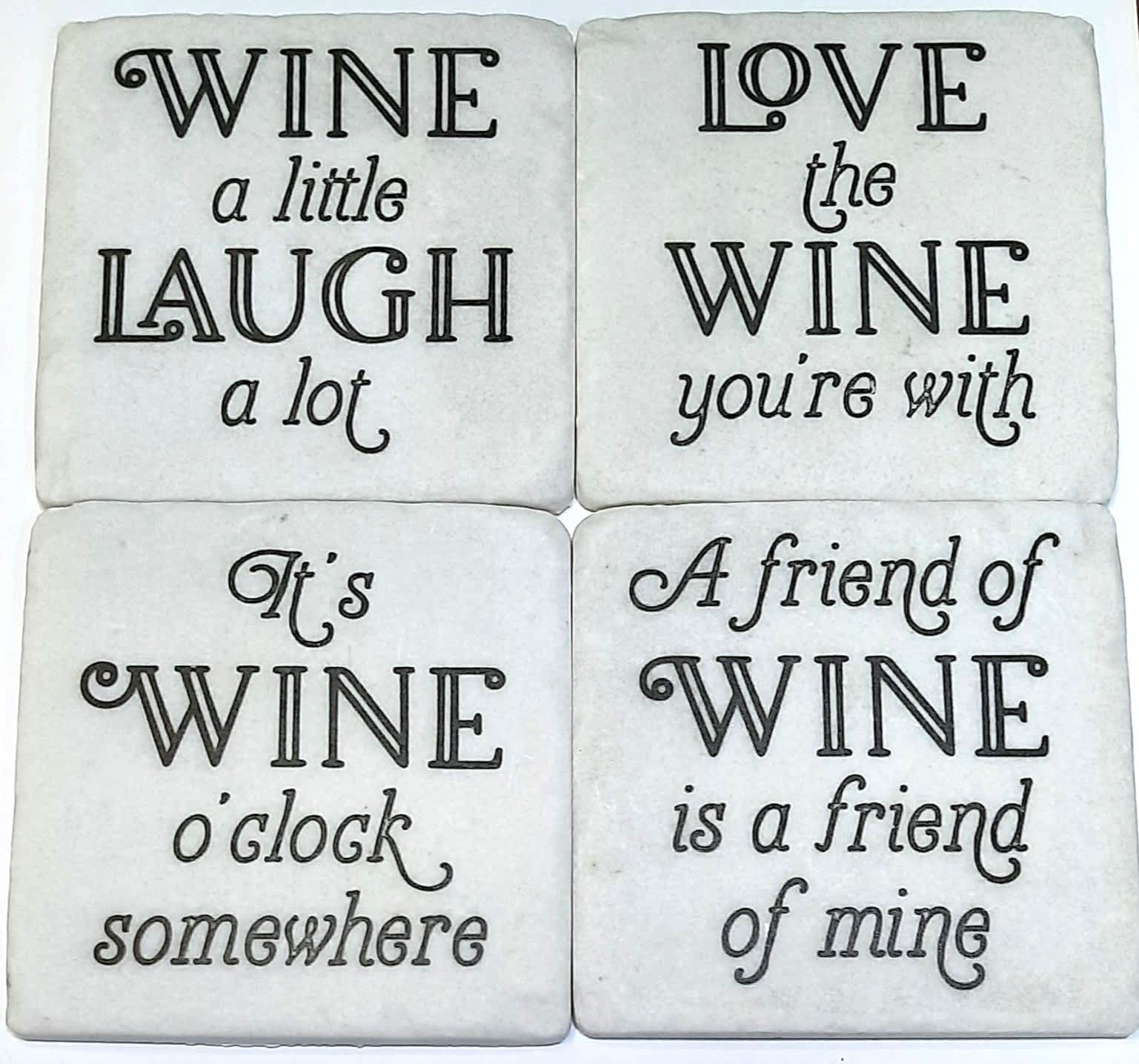 Four white coasters with black wine-themed sayings