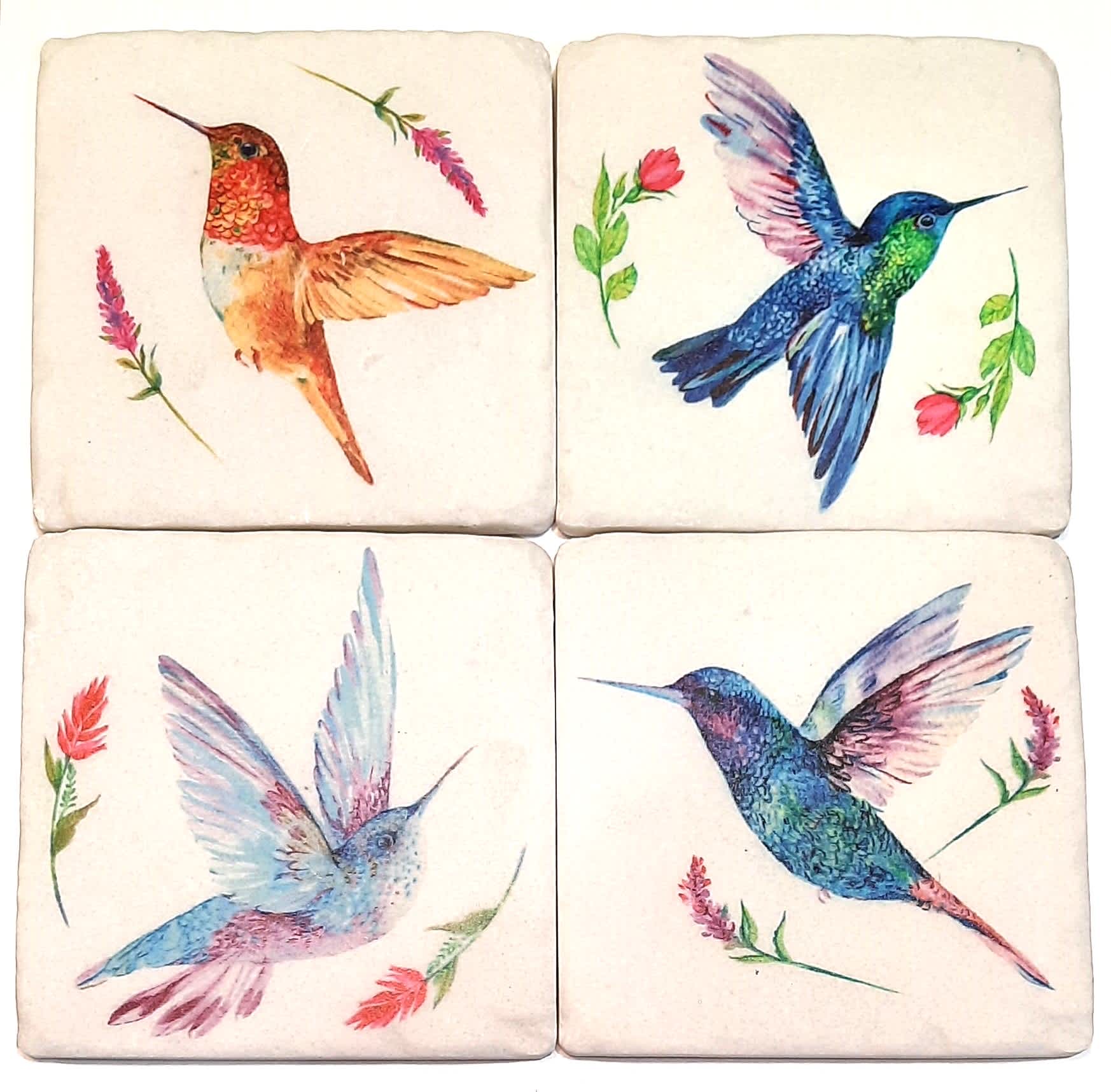 Four square coasters with watercolor hummingbirds and small flowers