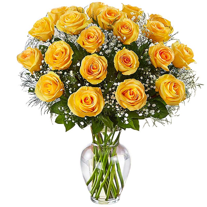 2 Dozen Long Stem Yellow Roses - Bright, cheerful, and beautifully abundant, this stunning arrangement of two dozen long stem yellow roses is a joyful way to celebrate friendship, appreciation, and positive moments. Yellow roses are traditionally associated with happiness, optimism, and warm connections, making this bouquet uplifting and meaningful.  Expertly arranged with fresh greenery and delicate filler flowers, this generous rose bouquet is perfect for birthdays, celebrations, Valentine’s Day, or sending encouragement and gratitude. With twenty-four long stem yellow roses, this arrangement creates a fuller, radiant display that brings sunshine and smiles wherever it’s sent.
