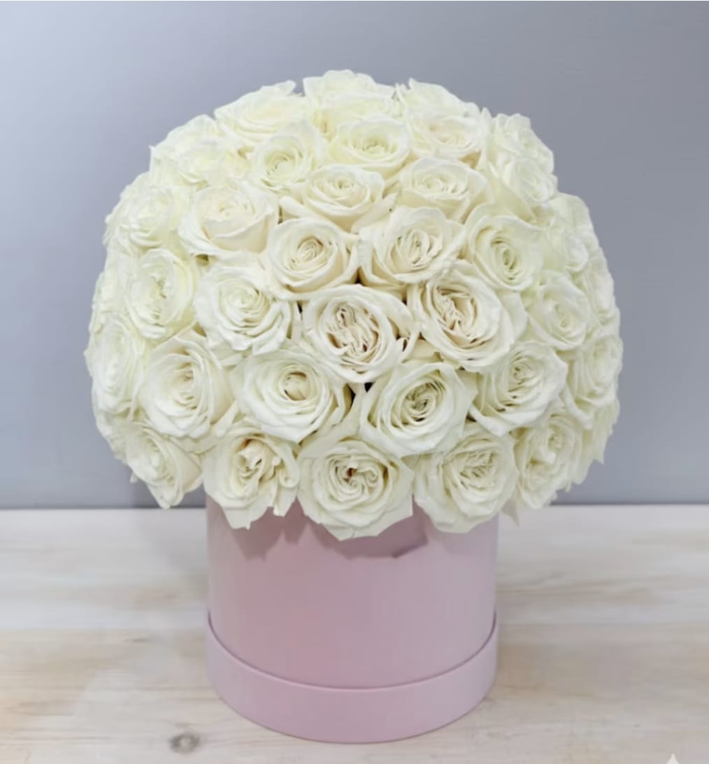 Pink &amp; White Rose Hat Box - WeHo  - This lavender hat box is filled with elegant white roses. The standard size holds about 50 roses.