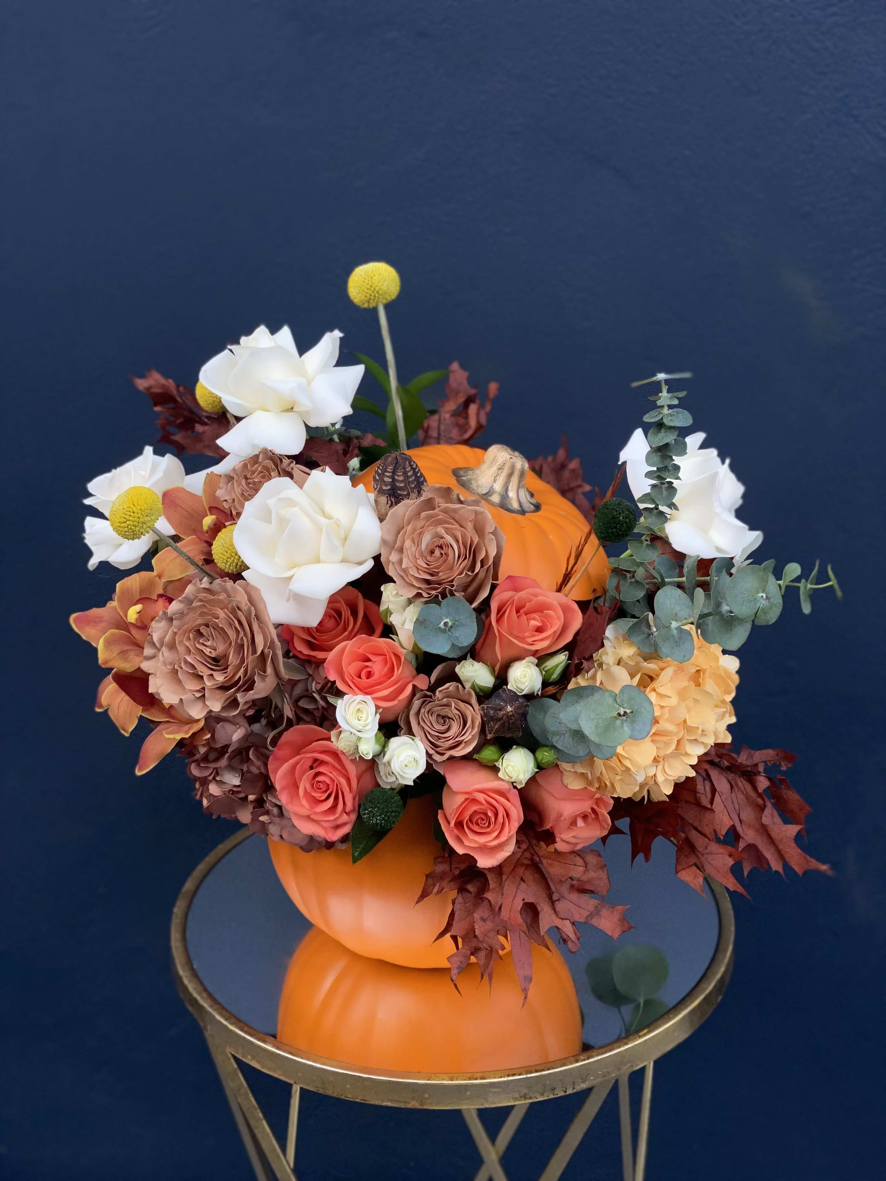 Happy Thanksgiving - Seasonal mix arrangement in fall colors in a pumpkin  