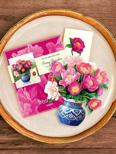 Pop-up greeting card with pink peonies and a blue vase illustration