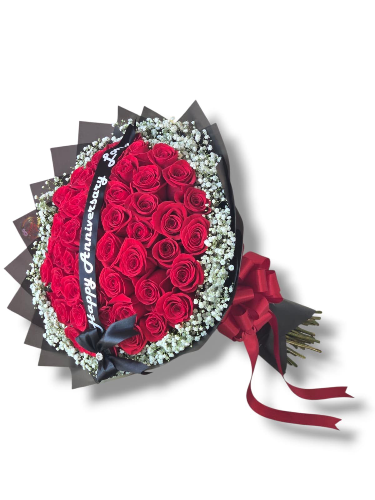 Bouquet of red roses with baby's breath and a ribbon