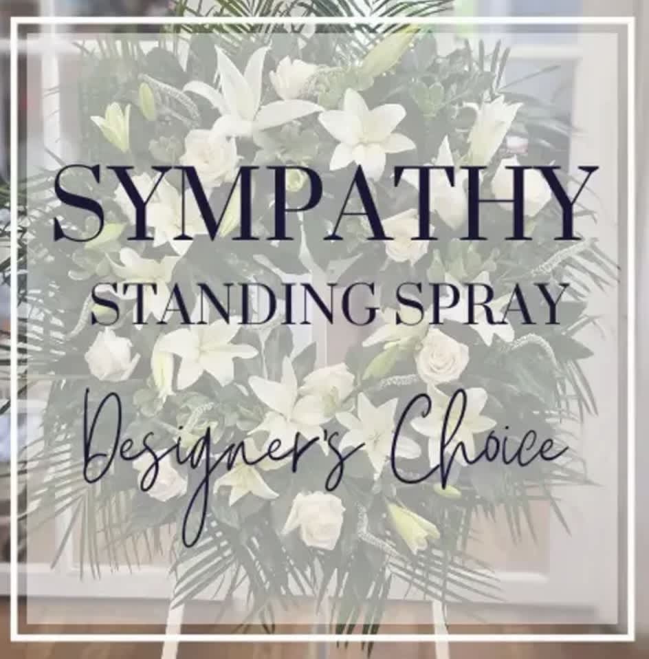 White sympathy standing spray with lilies and roses
