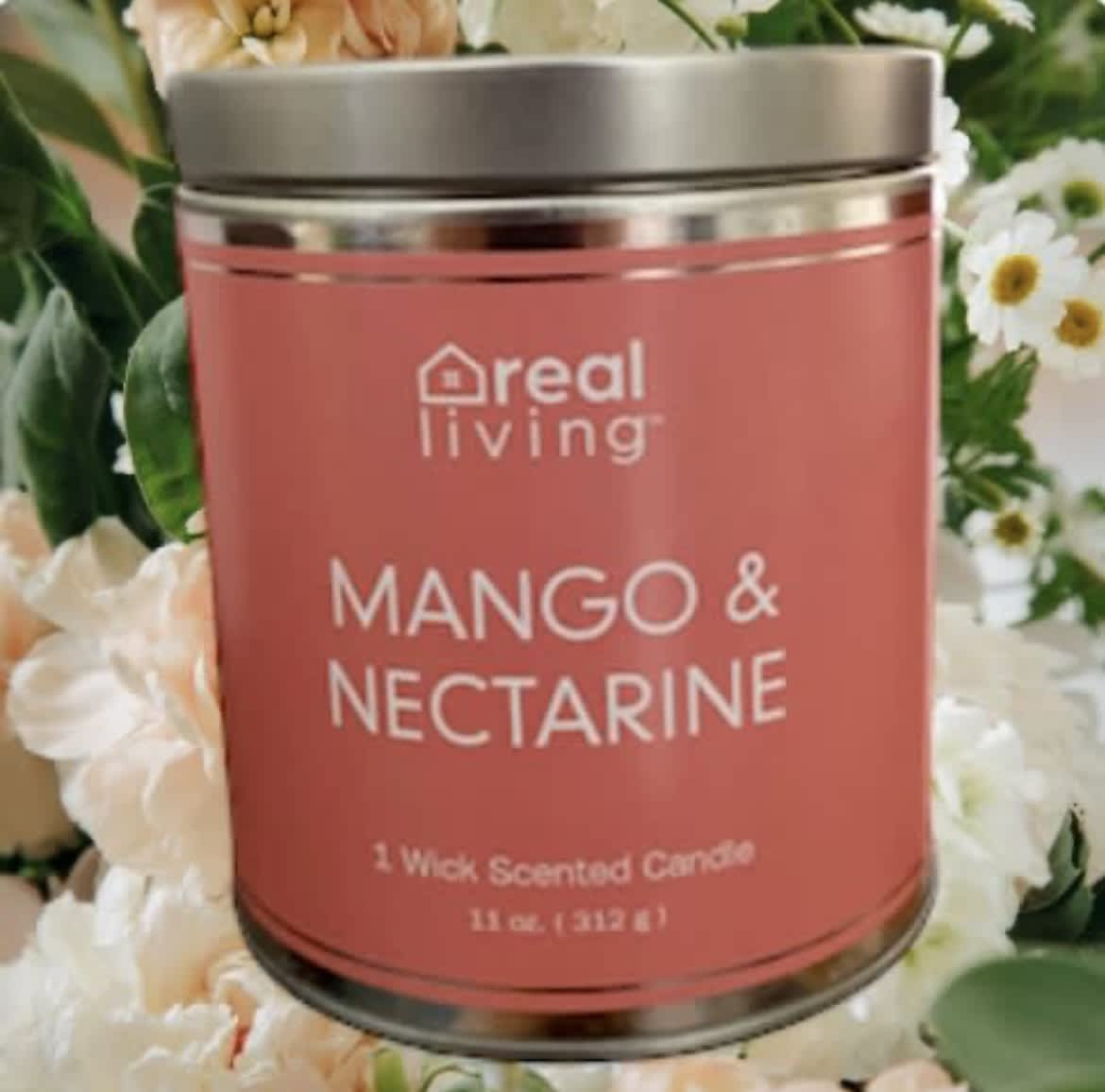 Pink mango and nectarine scented candle in a metal tin