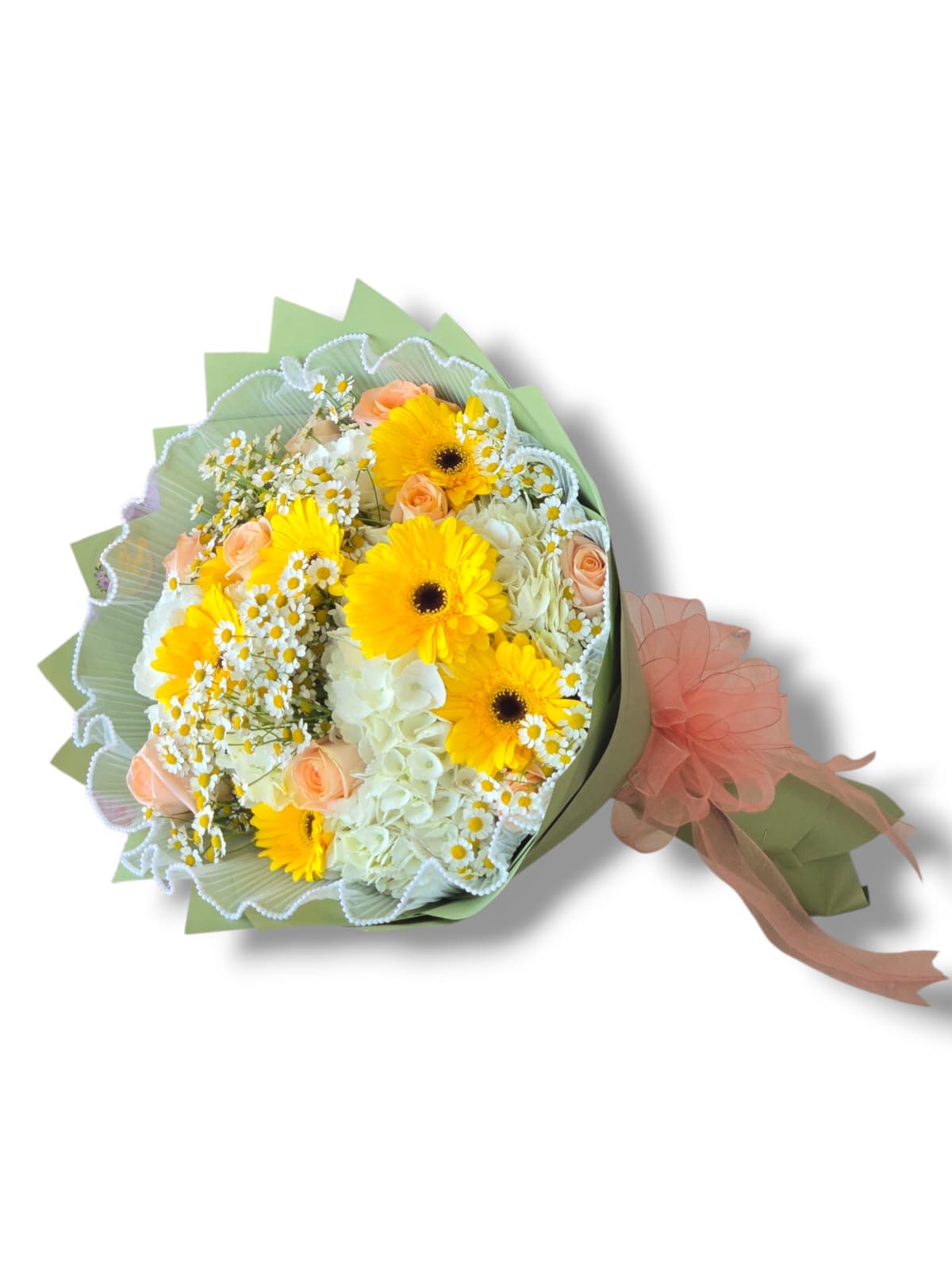 Bouquet of yellow gerbera daisies, peach roses, and white flowers wrapped in green paper
