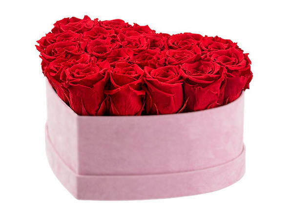 Heart-shaped box of red roses with a pink wrap