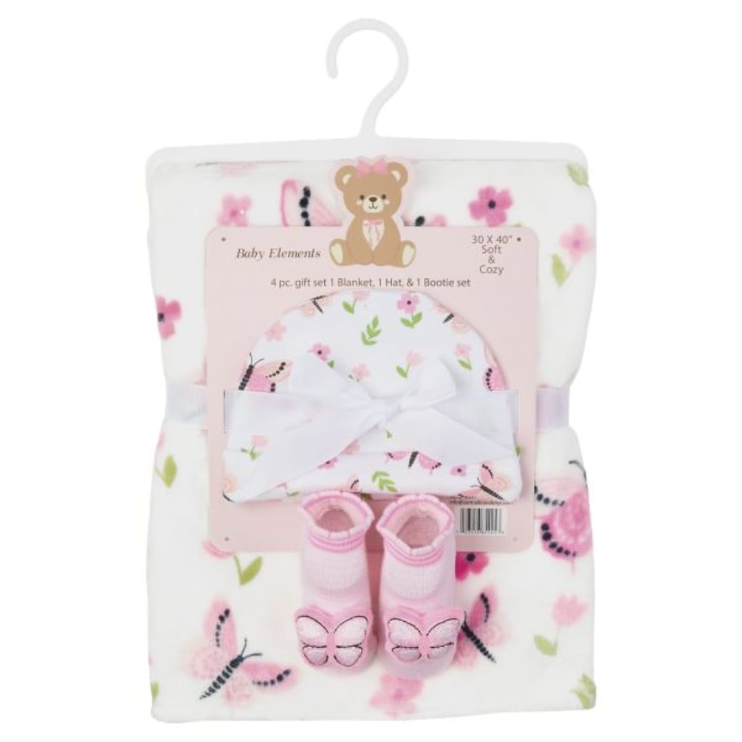Baby gift set with a floral blanket, hat, and booties on a hanger