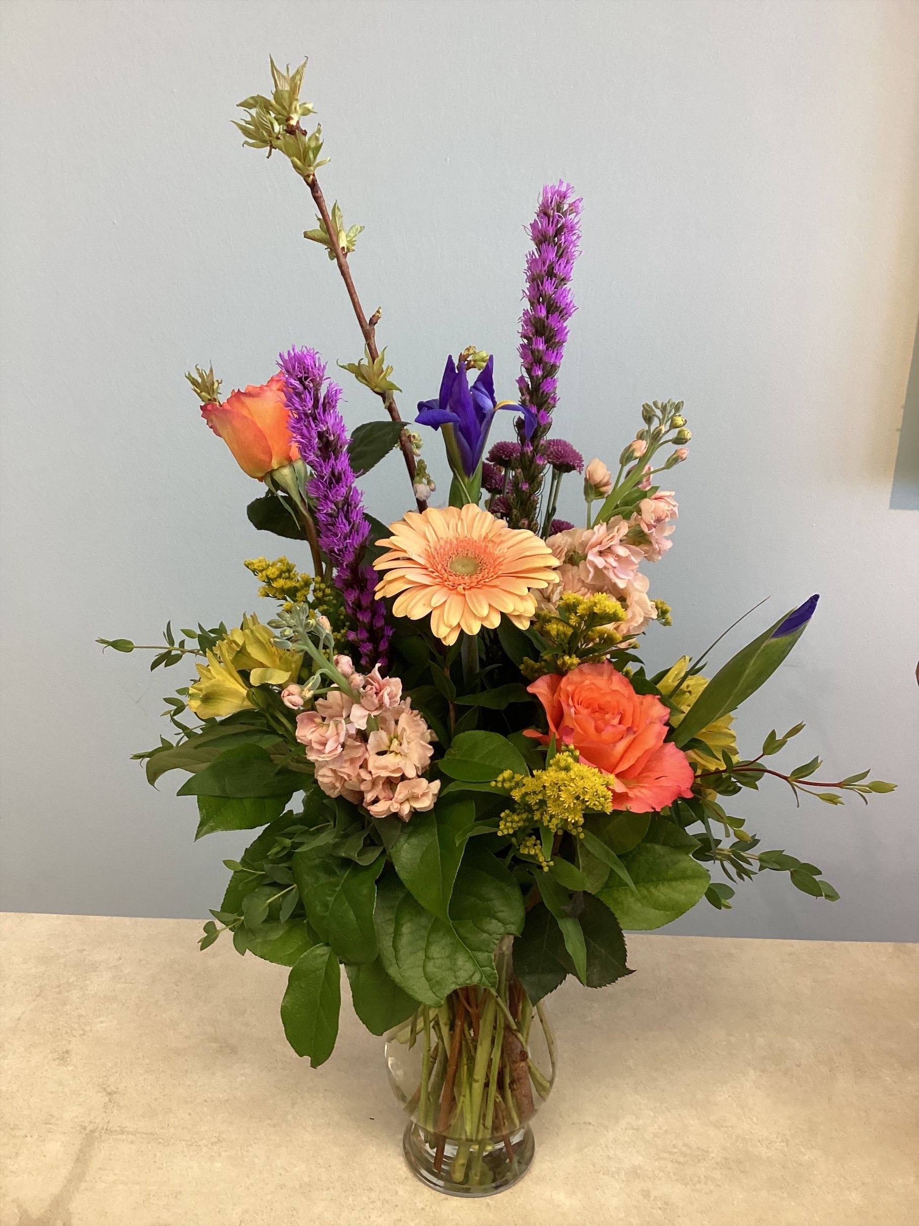 Endless Summer - Cheers to Mom is sure to brighten up any mother. A beautiful assortment of roses, stock, gerbera daisy and other bright spring flowers. 