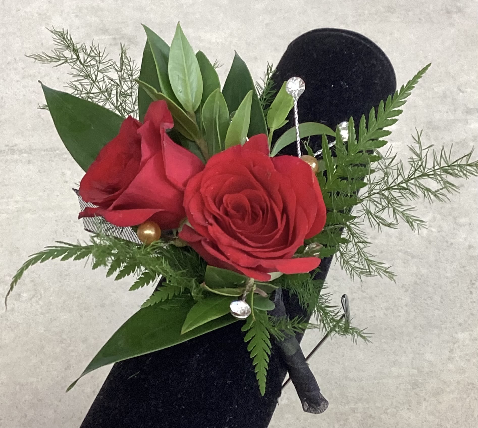Red Rose Boutonnière  - Red rose boutonnière with textured greenery and filler.