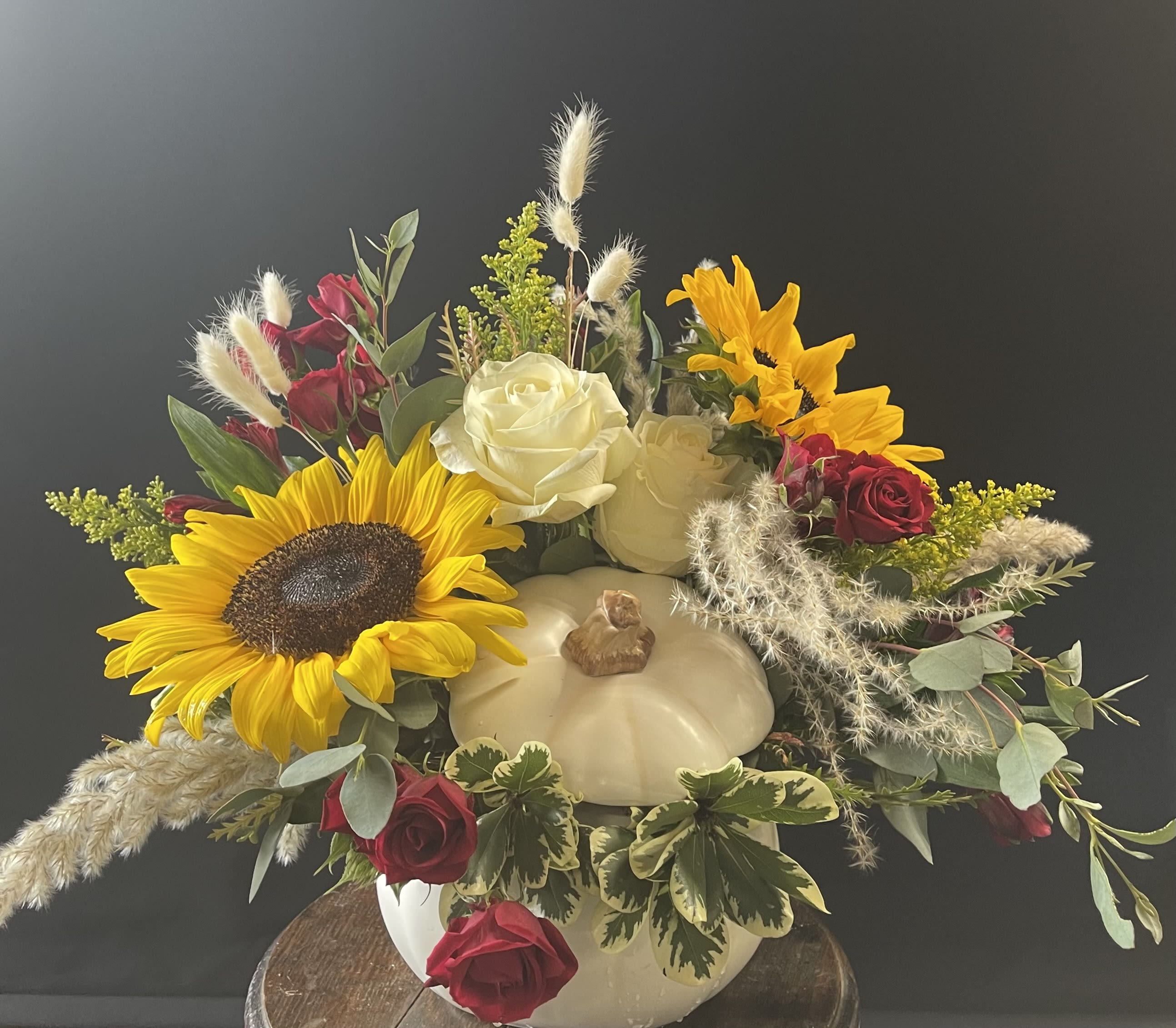 Blooming Harvest - Ceramic white pumpkin filled with fresh fall blooms to welcome in the harvest season.