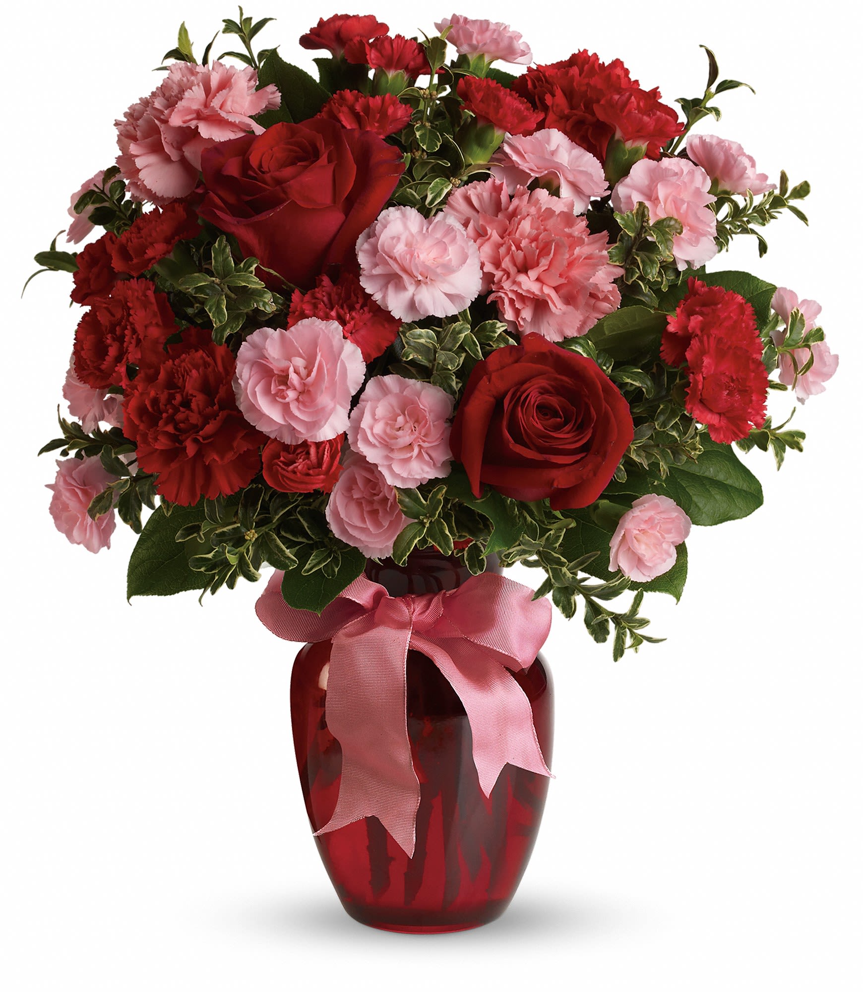 Red roses and pink carnations in a red vase with a pink ribbon