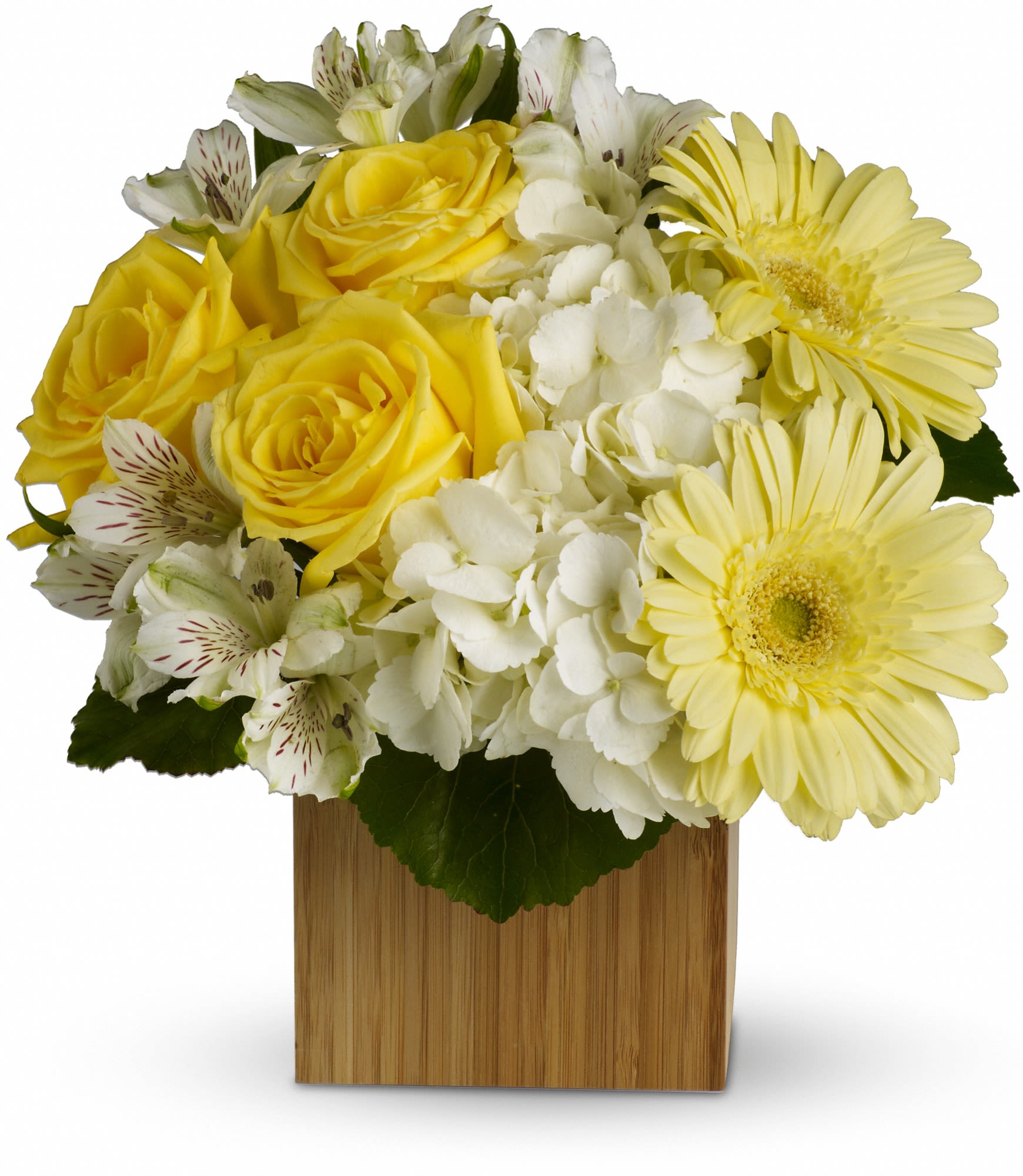 Yellow roses and pale yellow daisies in a wooden cube vase