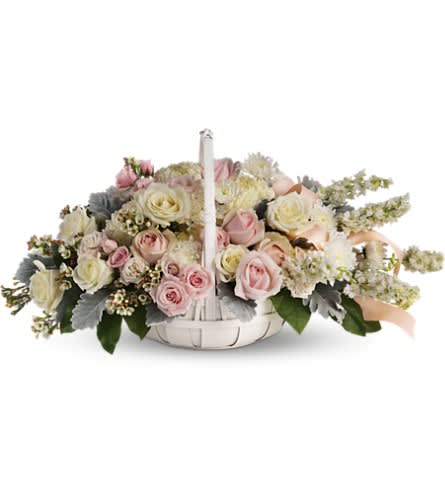 Dawn of Remembrance Basket - To offer comfort and consolation these serene softly colored roses and chrysanthemums are nestled in a round white basket with handle. Satin ribbon is threaded throughout to complement the soft look. Beautiful blooms such as white and light pink roses with white larkspur white mums and silvery dusty miller. Arranged in a white handled basket and accented with satin ribbon. Approximately 25" W x 12 1/2" H Orientation: All-Around As Shown : T236-2A