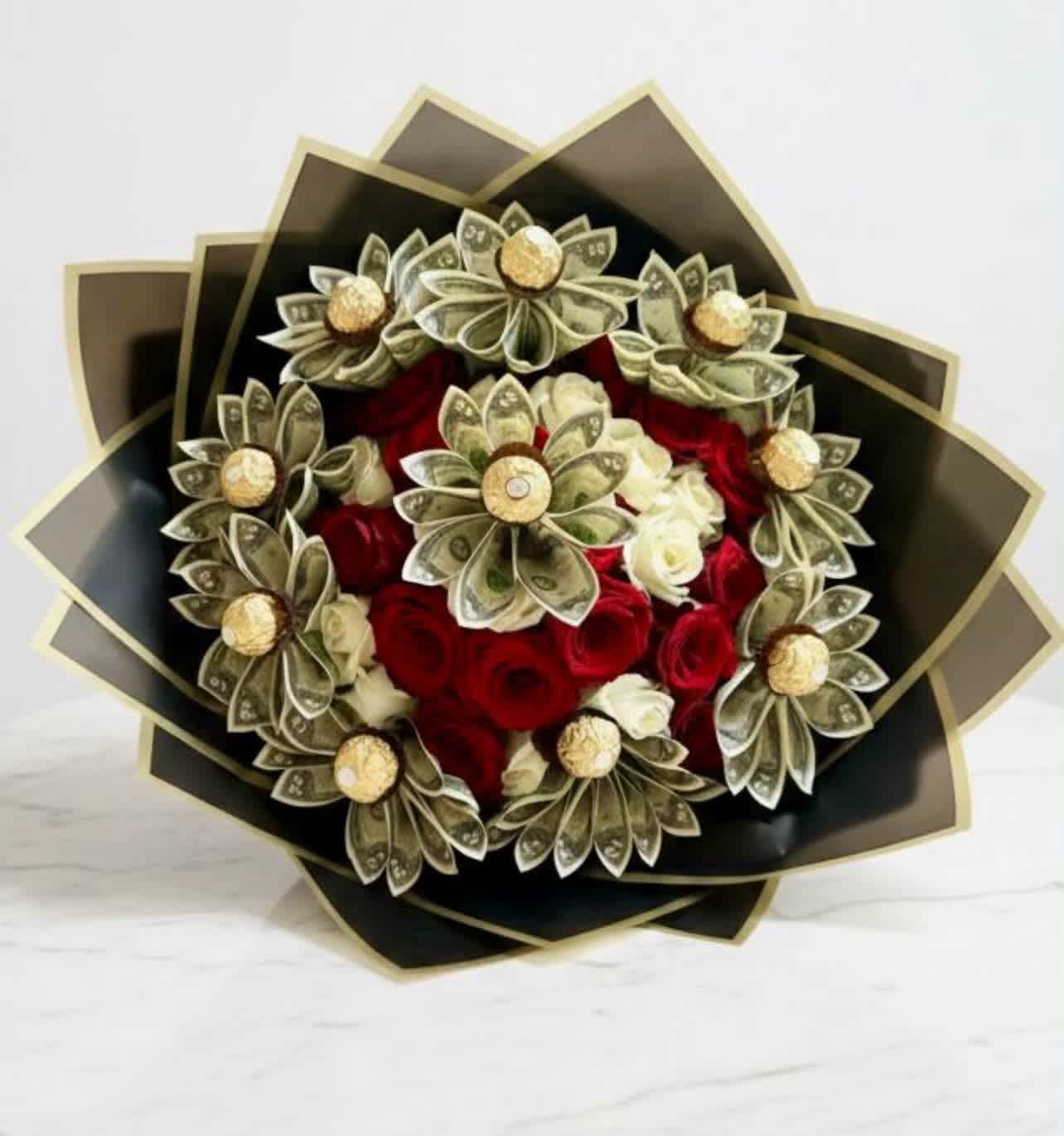 Bouquet of red and white roses wrapped with folded dollar bills