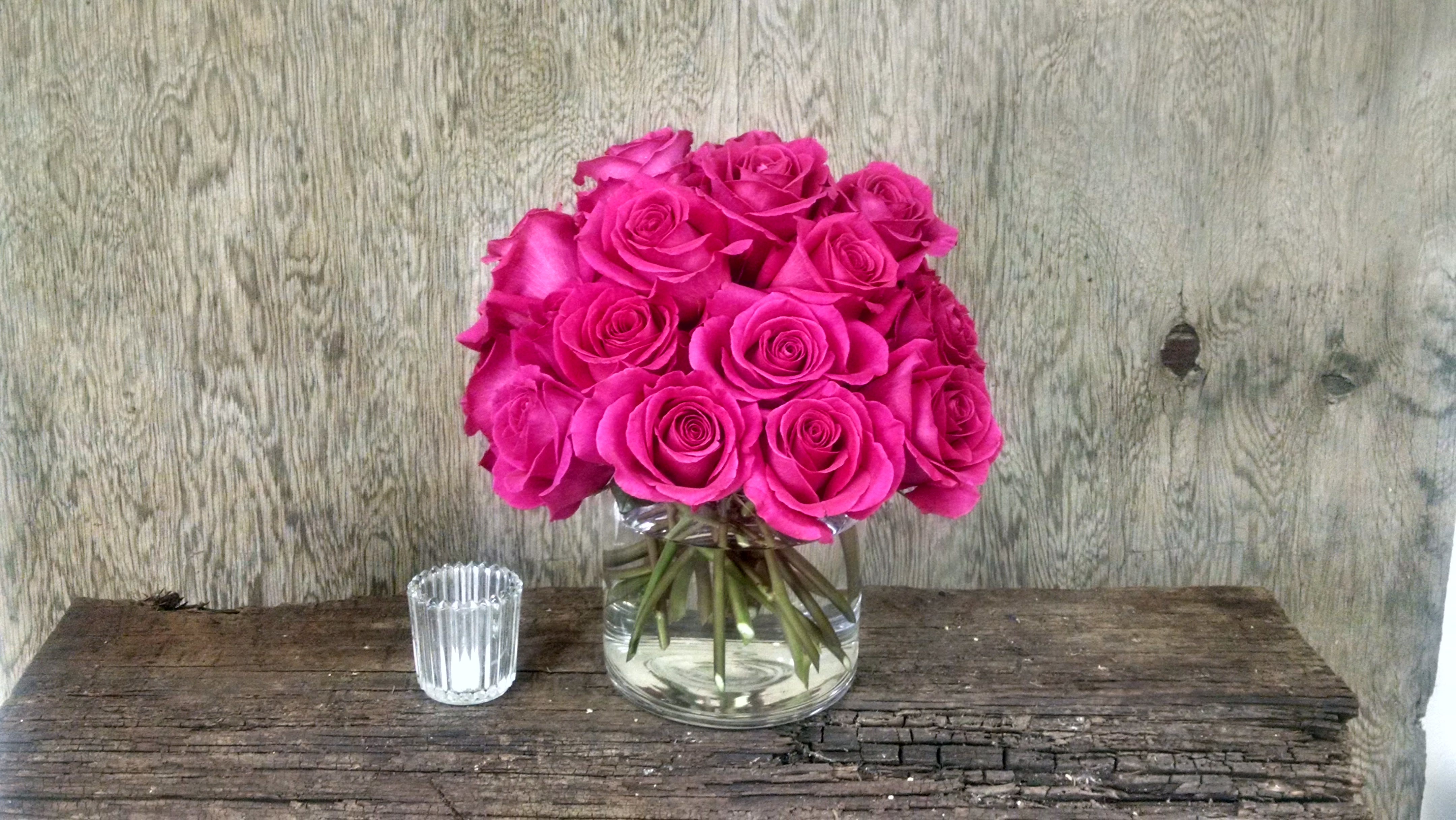 Two dozen Hot Pink Roses - Lovely hot pink roses in a modern cylinder 