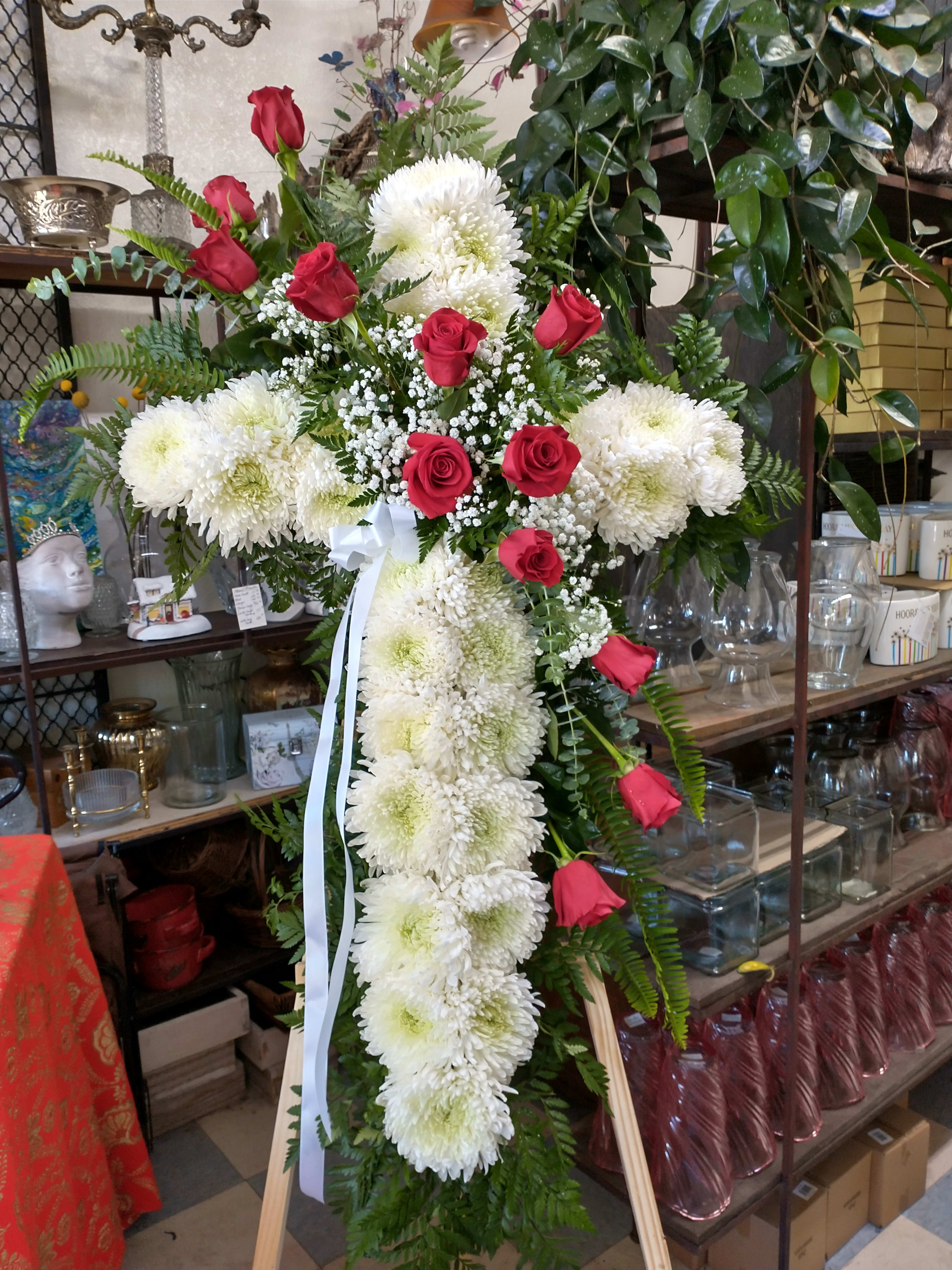 Standing floral cross with white chrysanthemums and red roses