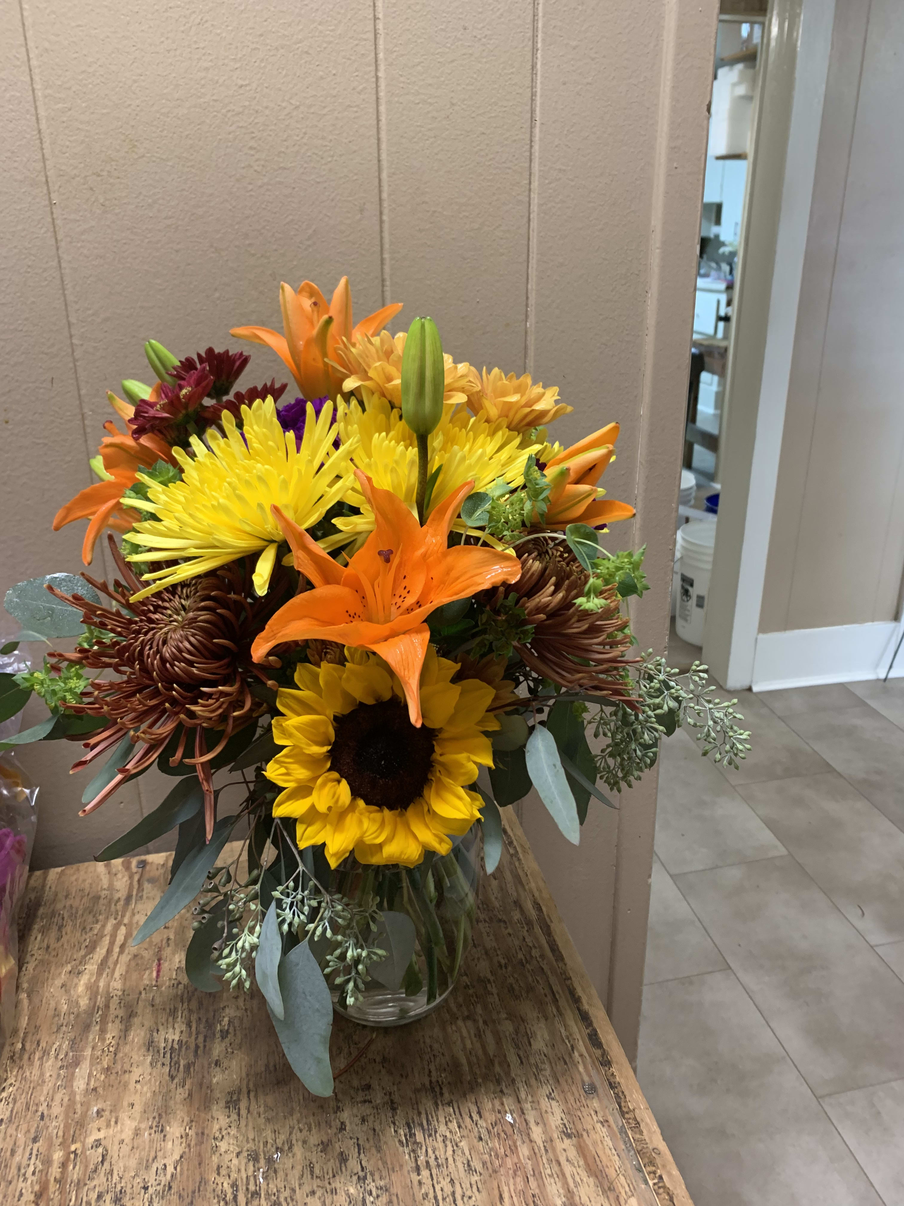 A Custom Fresh Mix Special  - Show how much you care with a vase filled with assorted fresh arrangement of mixed  flowers.  When you make this selection, we let our designers do what they do best. Create beautiful arrangements. Florals shown will be different. 