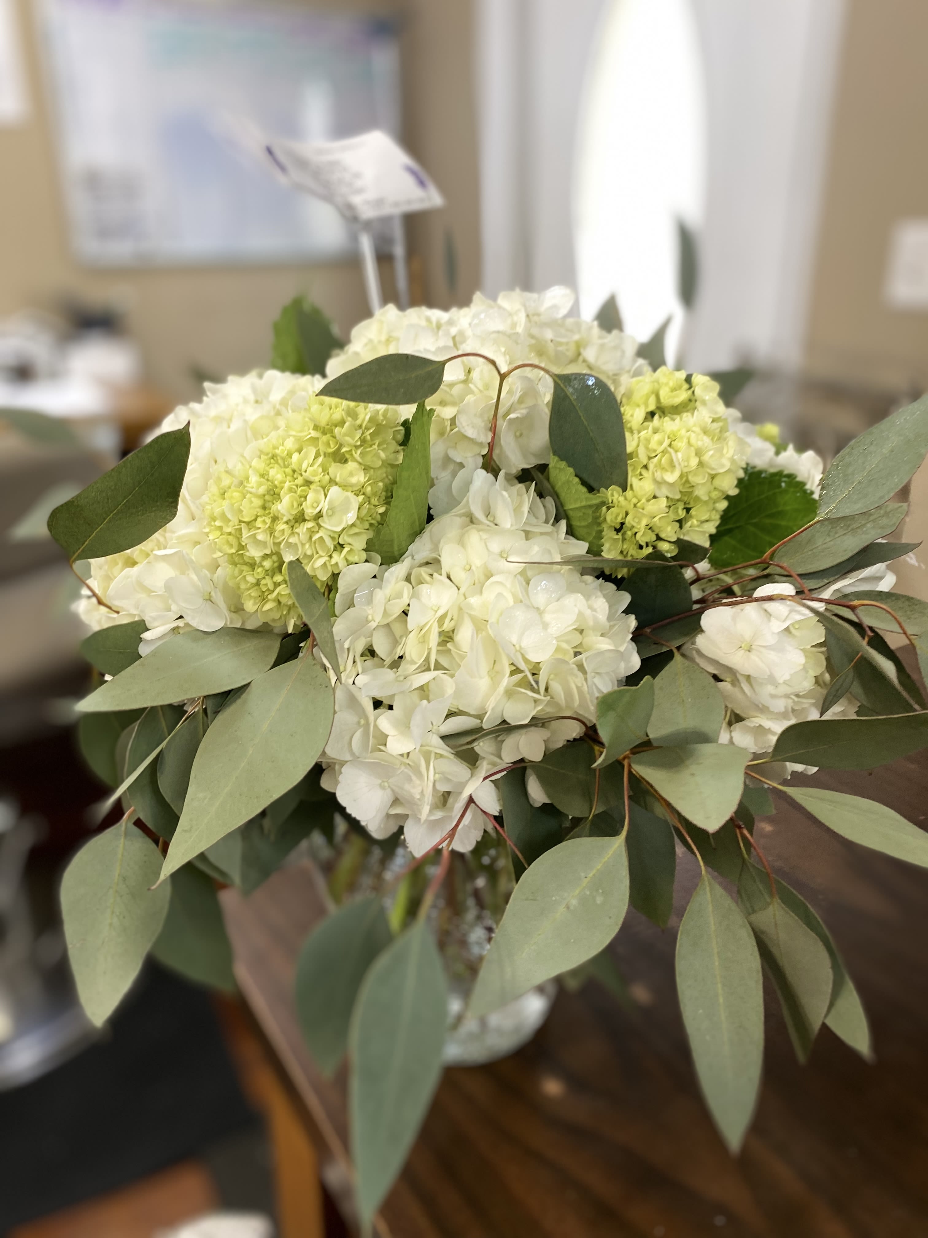 White hydrangea bouquet with eucalyptus greenery