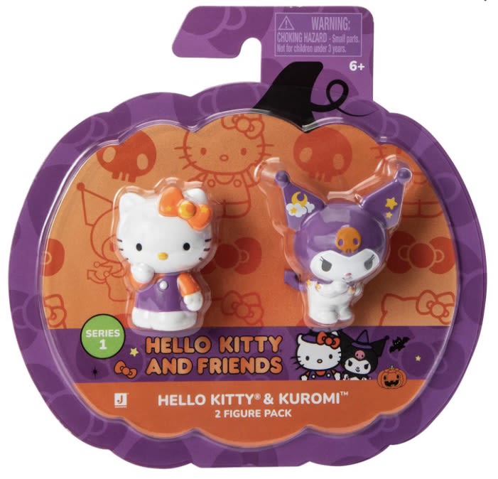 Packaged Hello Kitty and Kuromi figurines in a purple Halloween-themed box
