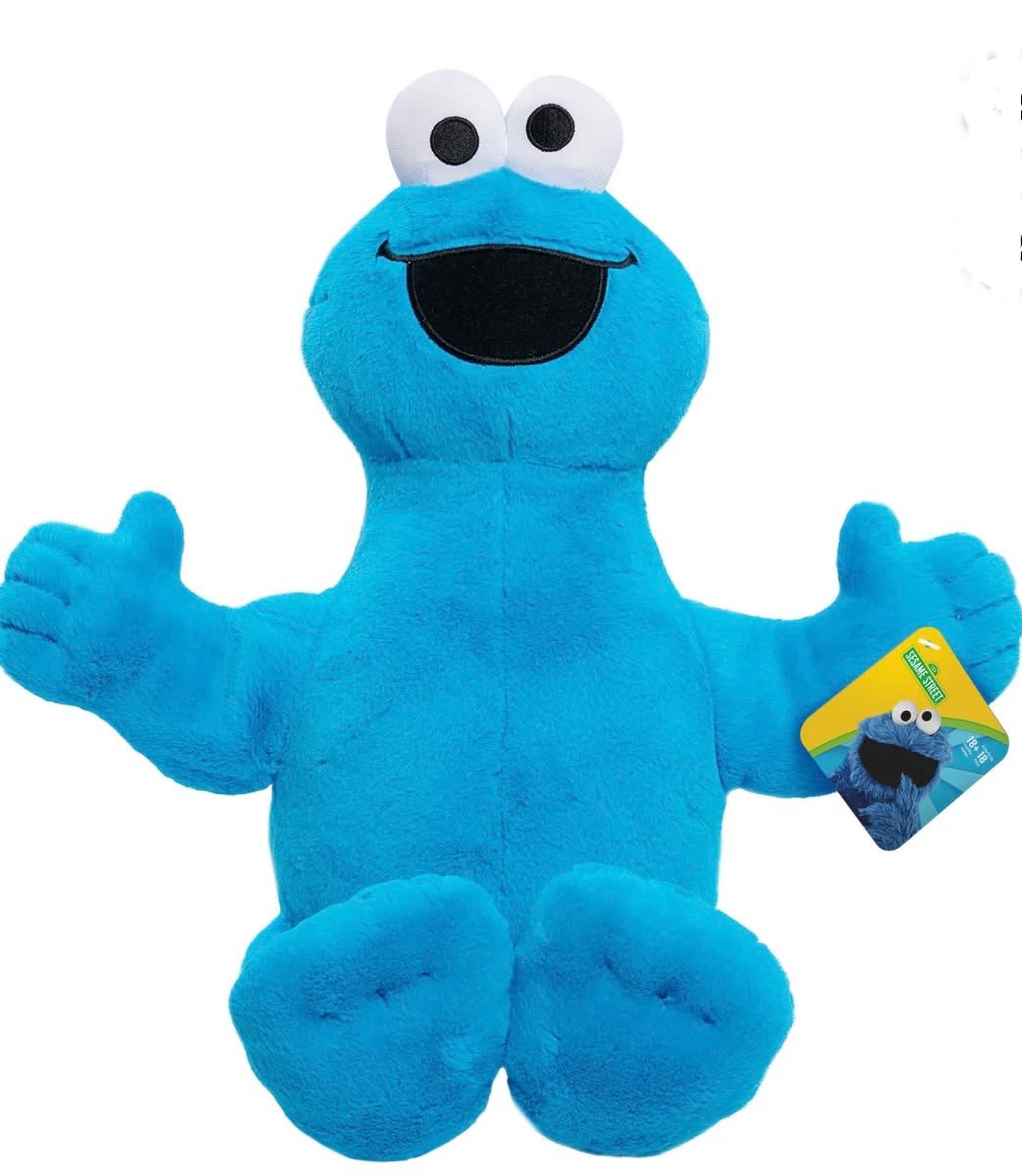 Blue Cookie Monster plush toy with outstretched arms