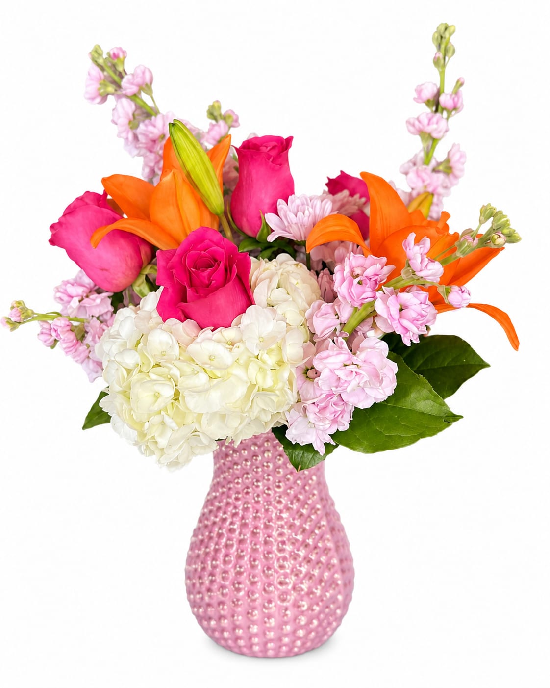 Pink and orange bouquet with roses, lilies, hydrangea, and a pink vase