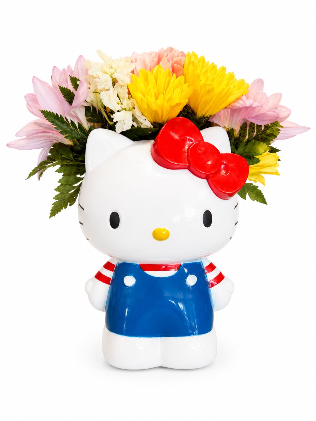 Hello Kitty planter filled with pink, yellow, and white flowers