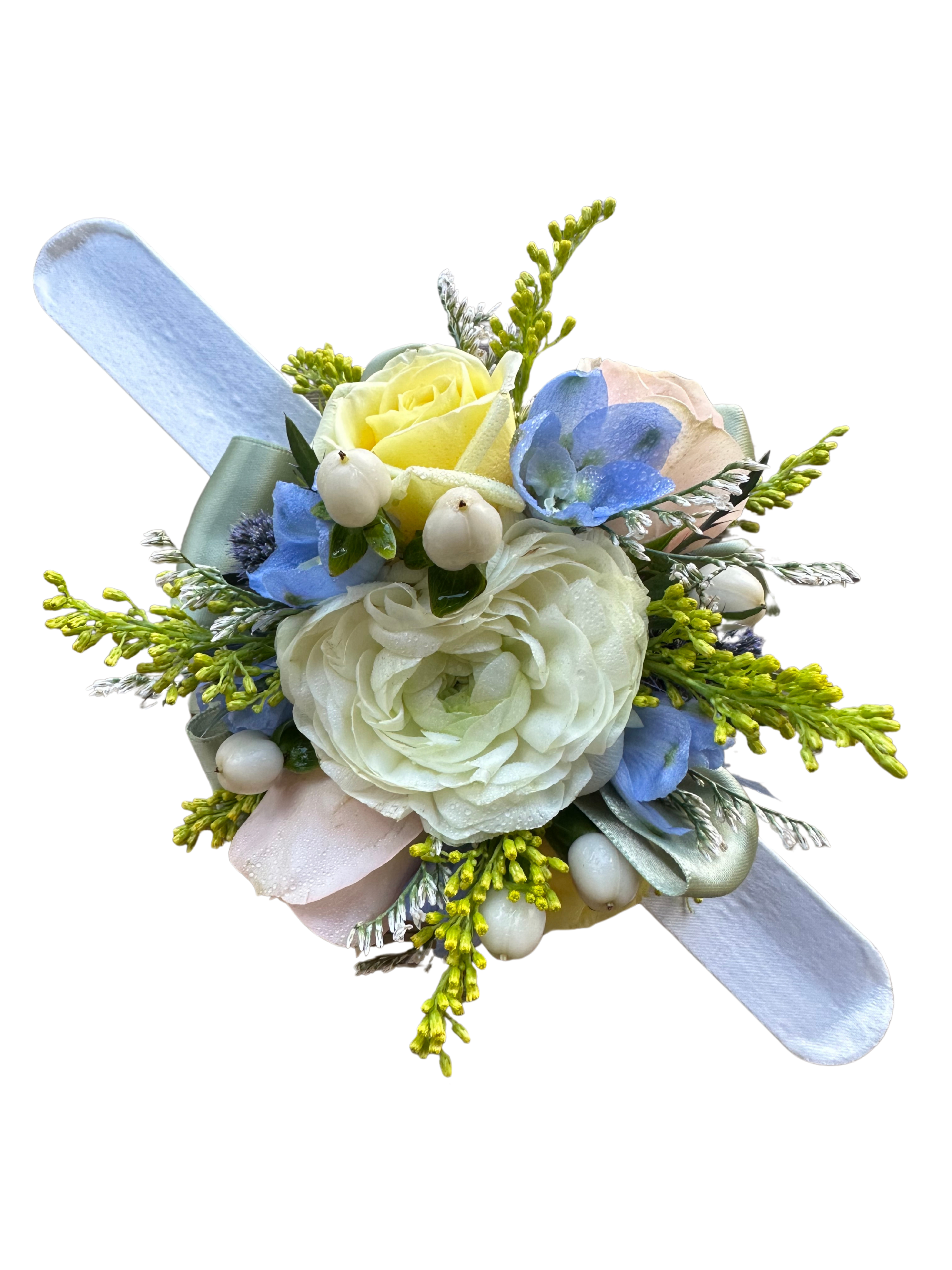 Small pastel corsage with blue and white flowers on a ribbon