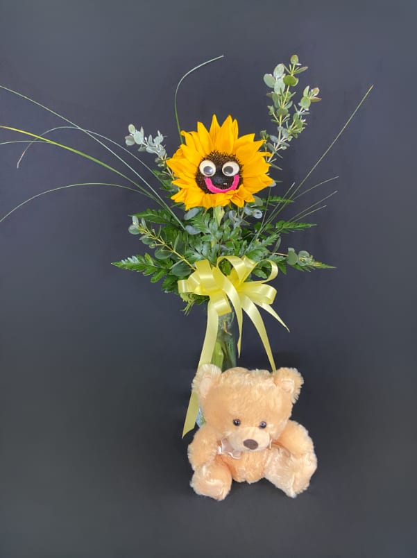 Sunflower arrangement with a teddy bear and yellow ribbon