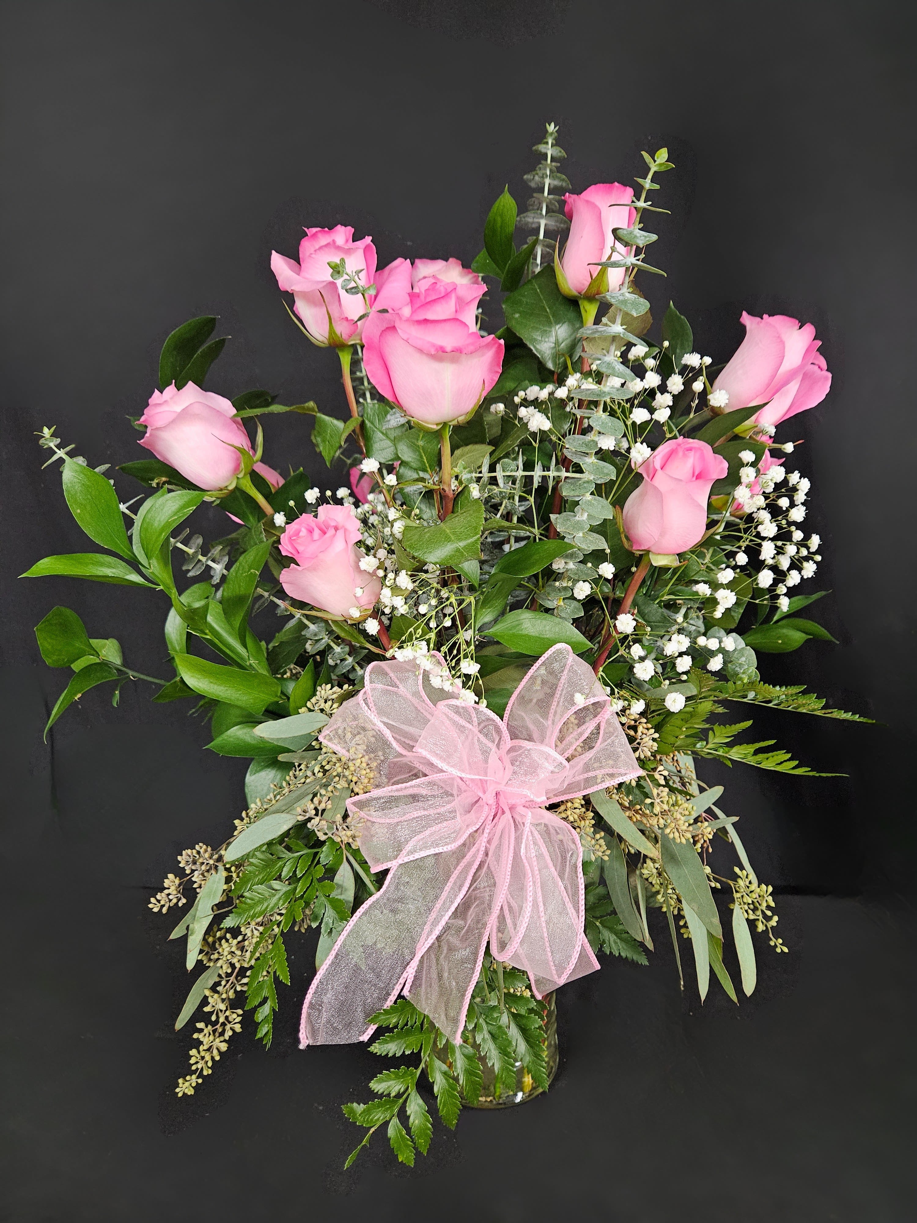 Classic Pink Roses - These pink roses are cheerful and fun! Dozen Long Stemmed Pink Roses by BloomNation™ is the perfect gift to show your love and appreciation. Standard (12 Roses), Deluxe (24 Roses), or Premium (36 Roses)