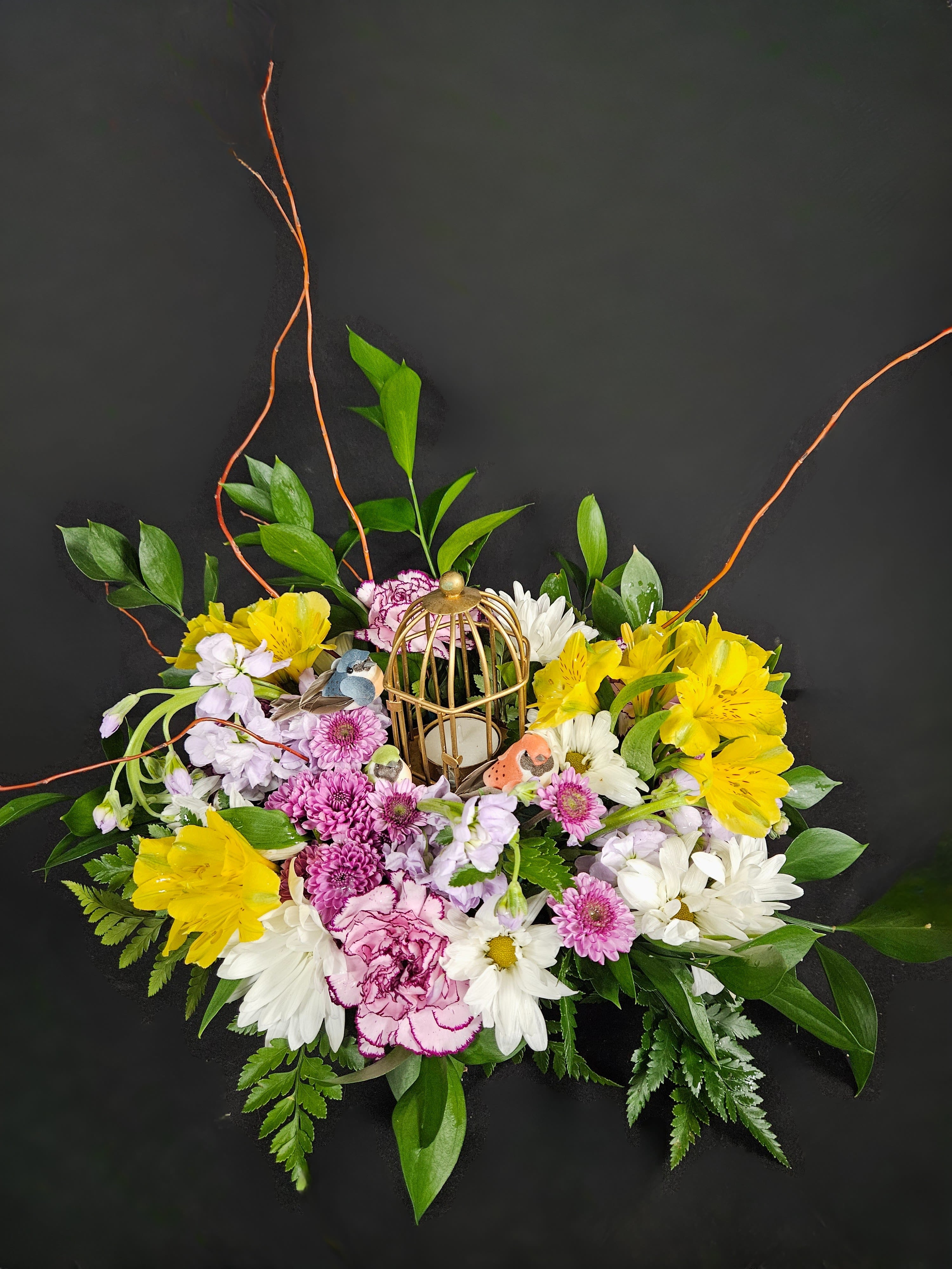 Tealight Delight - Birds alight on this tealight delight! A cute keepsake tealight cage is surrounded by elegant greens and beautiful blooms. Includes 2 bird figures and a burnable wax tea light. 