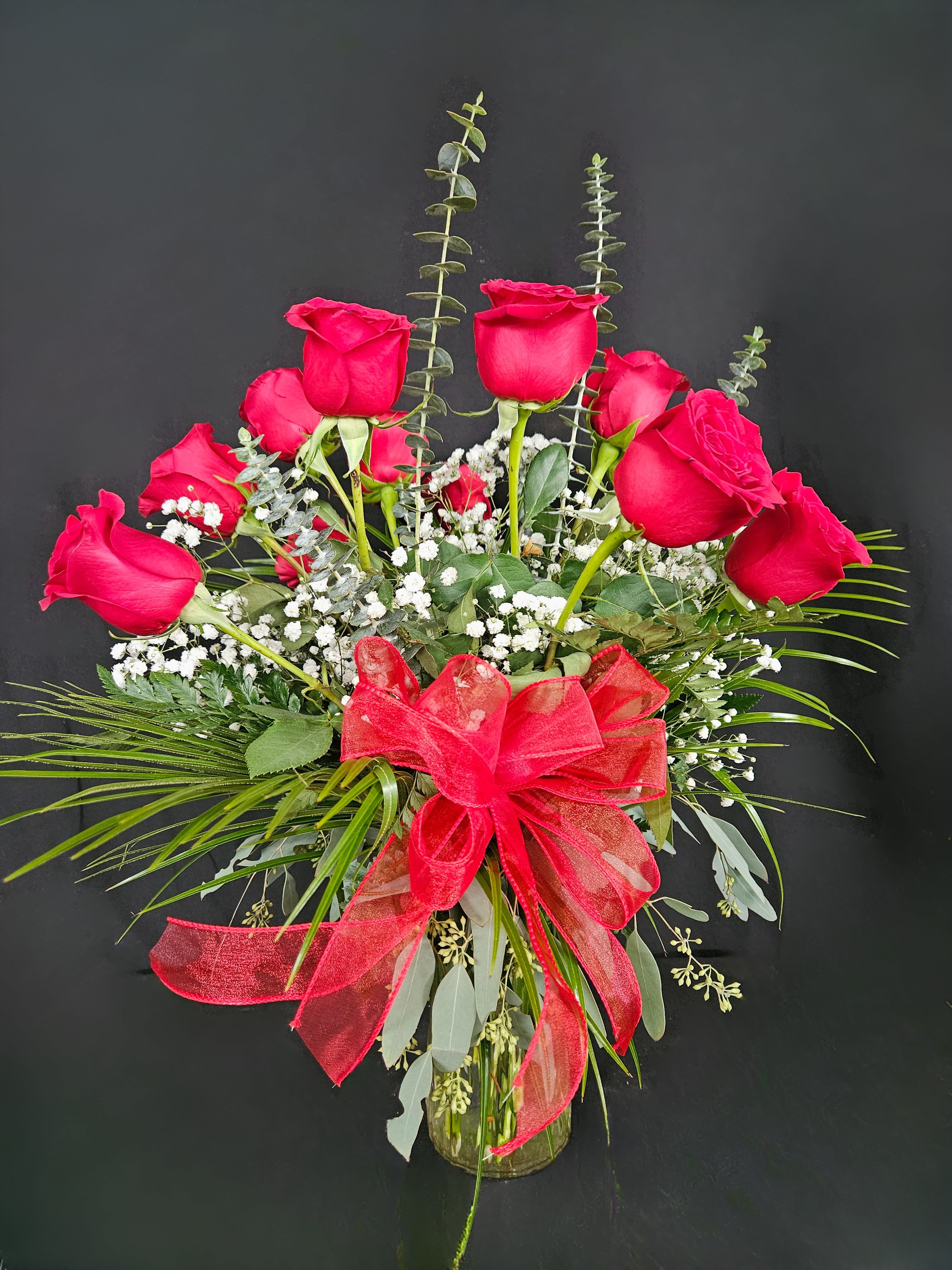 Classic Red Roses  - These dozen red roses with baby's breath are a classic! Perfect romantic gift for any occasion! Standard (12 Roses), Deluxe (24 Roses), or Premium (36 Roses)
