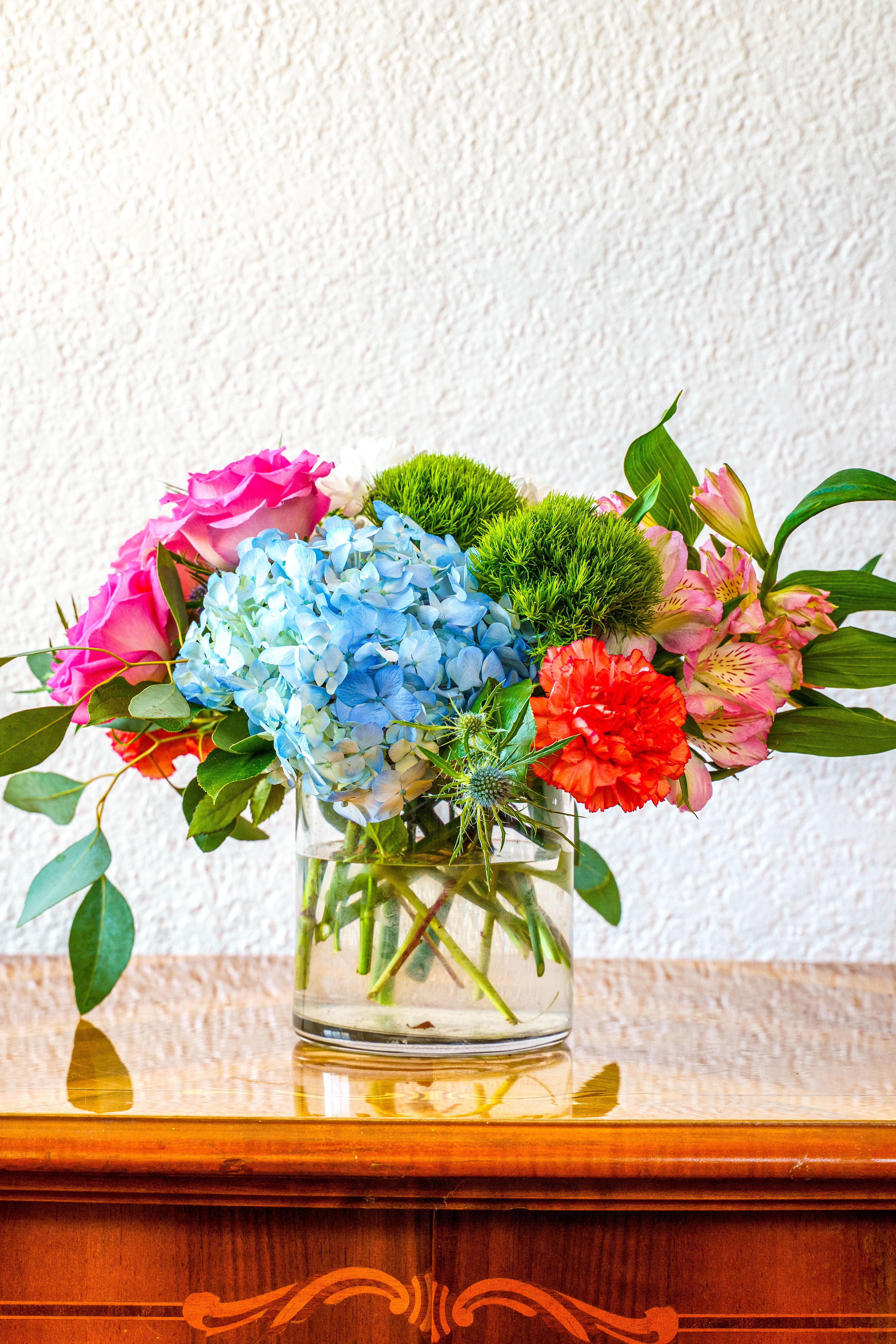 Daily Delight - Delight them with this wonderful assortment of colorful blooms. Perfect for corporate gifting, get well, or congratulations.