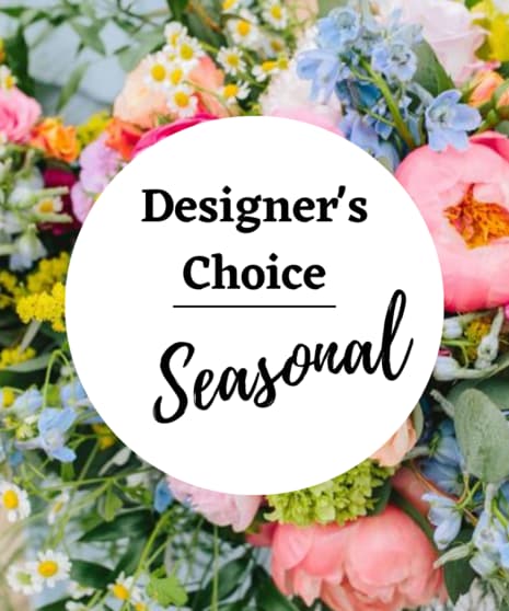 Designer’s Choice Seasonal floral arrangement with pastel blooms