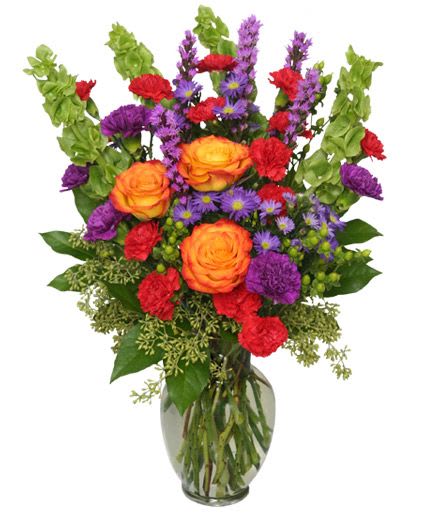 Colorful mixed bouquet in a clear glass vase