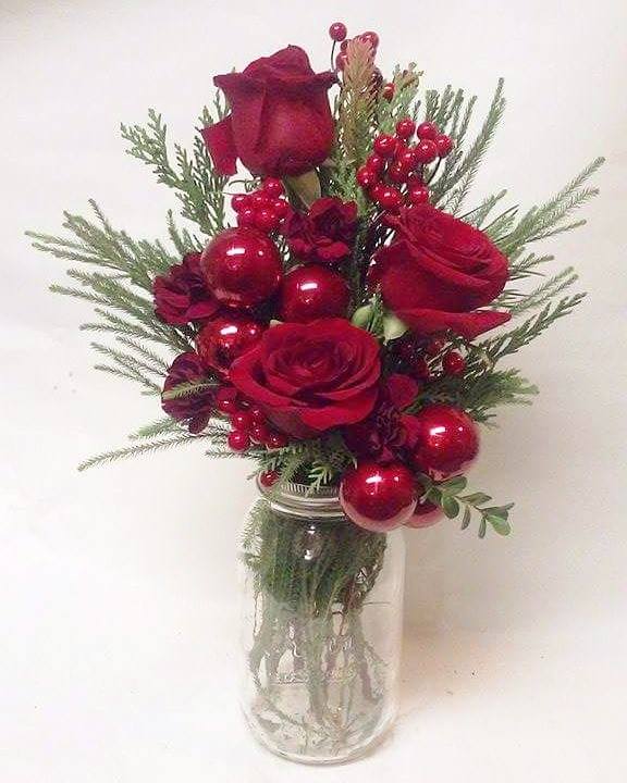 Lily Rose  Ornament Mason Jar  - Red roses White Oriental lilies, Berries, Ornaments and seasonal greens in a mason jar.