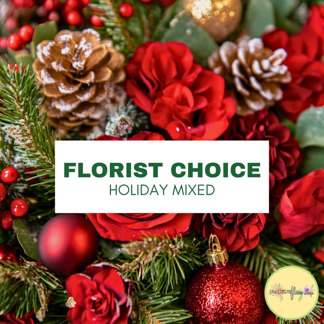 Holiday mixed arrangement with red roses and pinecones