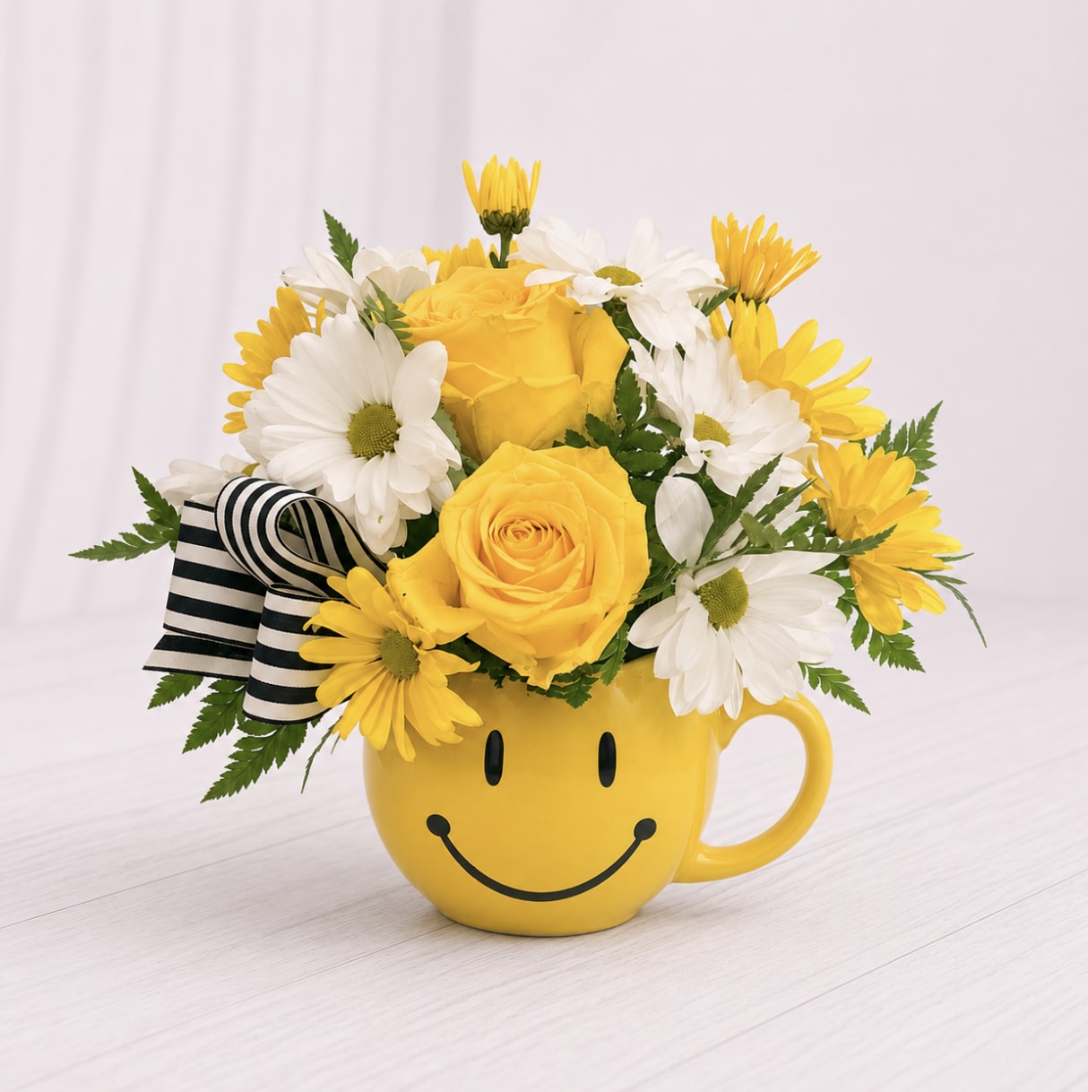 Be Happy  - This smile arrangement is full of yellow and white blooms with out signature ribbon! 