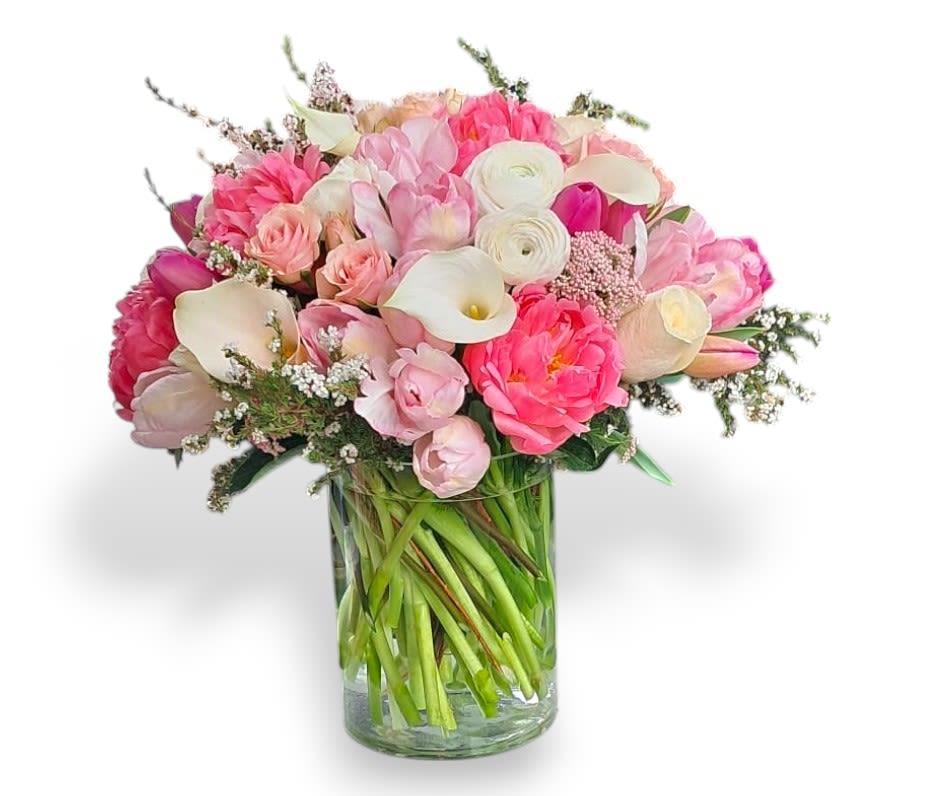 Pink and white mixed bouquet in a clear glass vase
