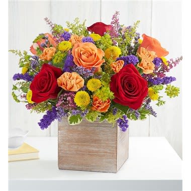 Delightful Joy  Bouquet - exclusive bouquet features a gathering of blooms in bright, cheerful colors, creating the perfect complement to our rustic, grey-washed wooden cube. With its soft tones and natural textures