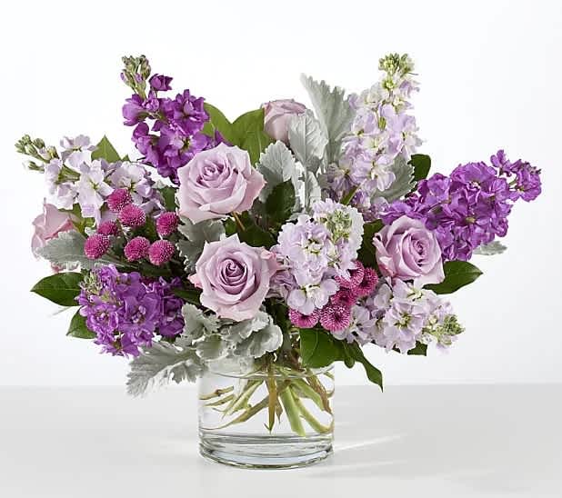 One in a Million Bouquet - A special person deserves a special gift! The One in a Million Bouquet is a unique design of lavender roses and fragrant, purple stock to make their day sweet as can be.
