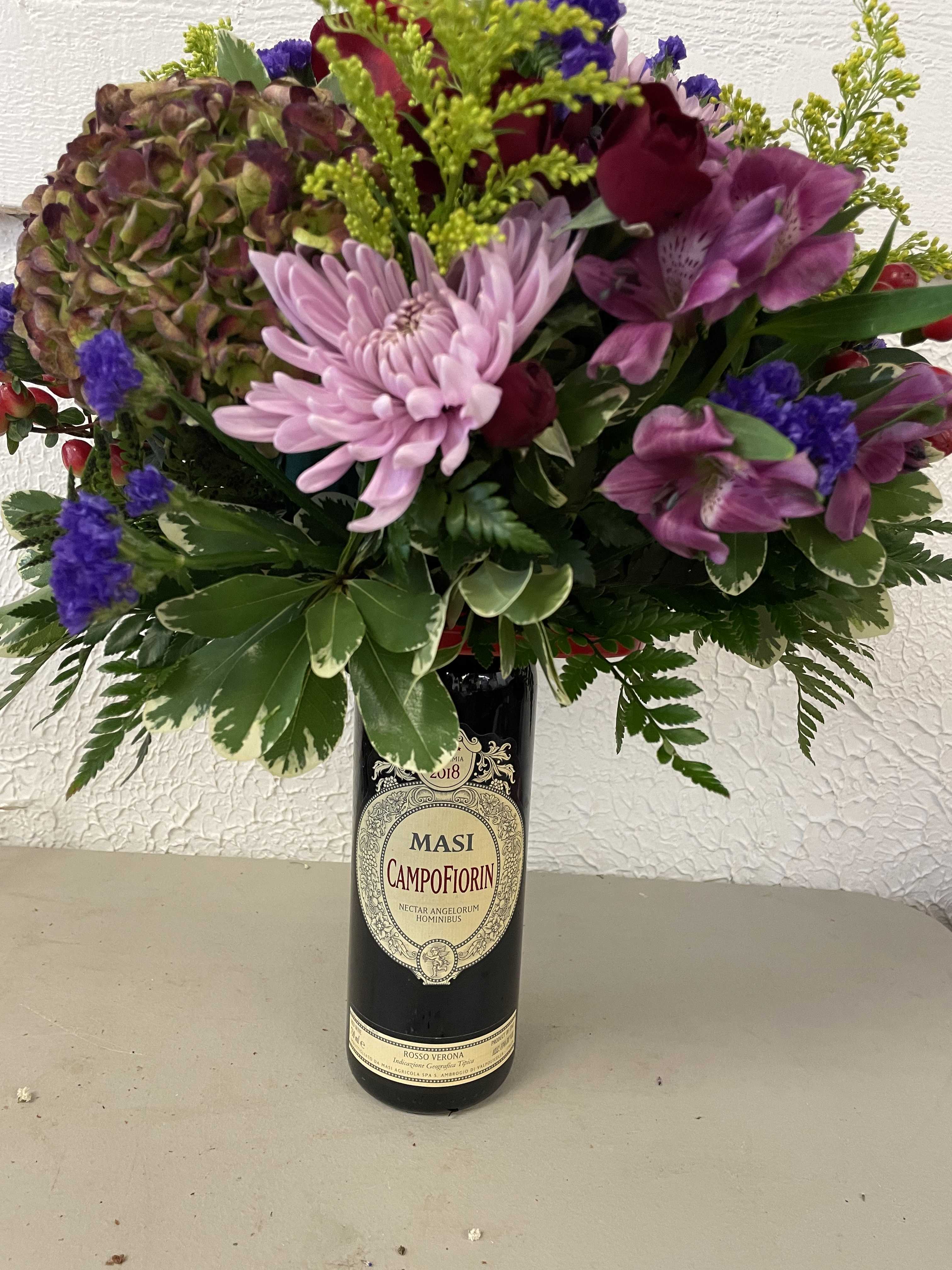 FLOWERS &amp; WINE - WE WILL MAKE A BEAUTIFAL SEASONAL ARRANGEMENT ON THE BOTTLE OF WINE. PLEASE LET US KNOW IF YOU WOULD LIKE RED OR WHITE.