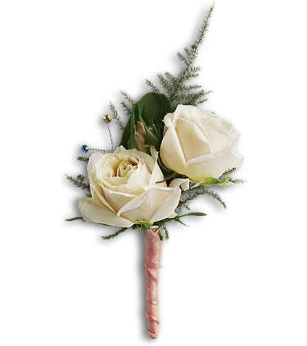 White rose boutonniere with greenery and a pink wrapped stem