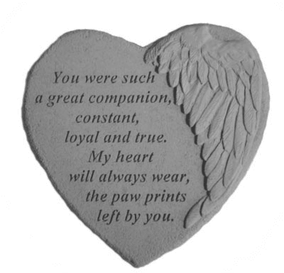 Heart-shaped memorial stone with engraved text and angel wing