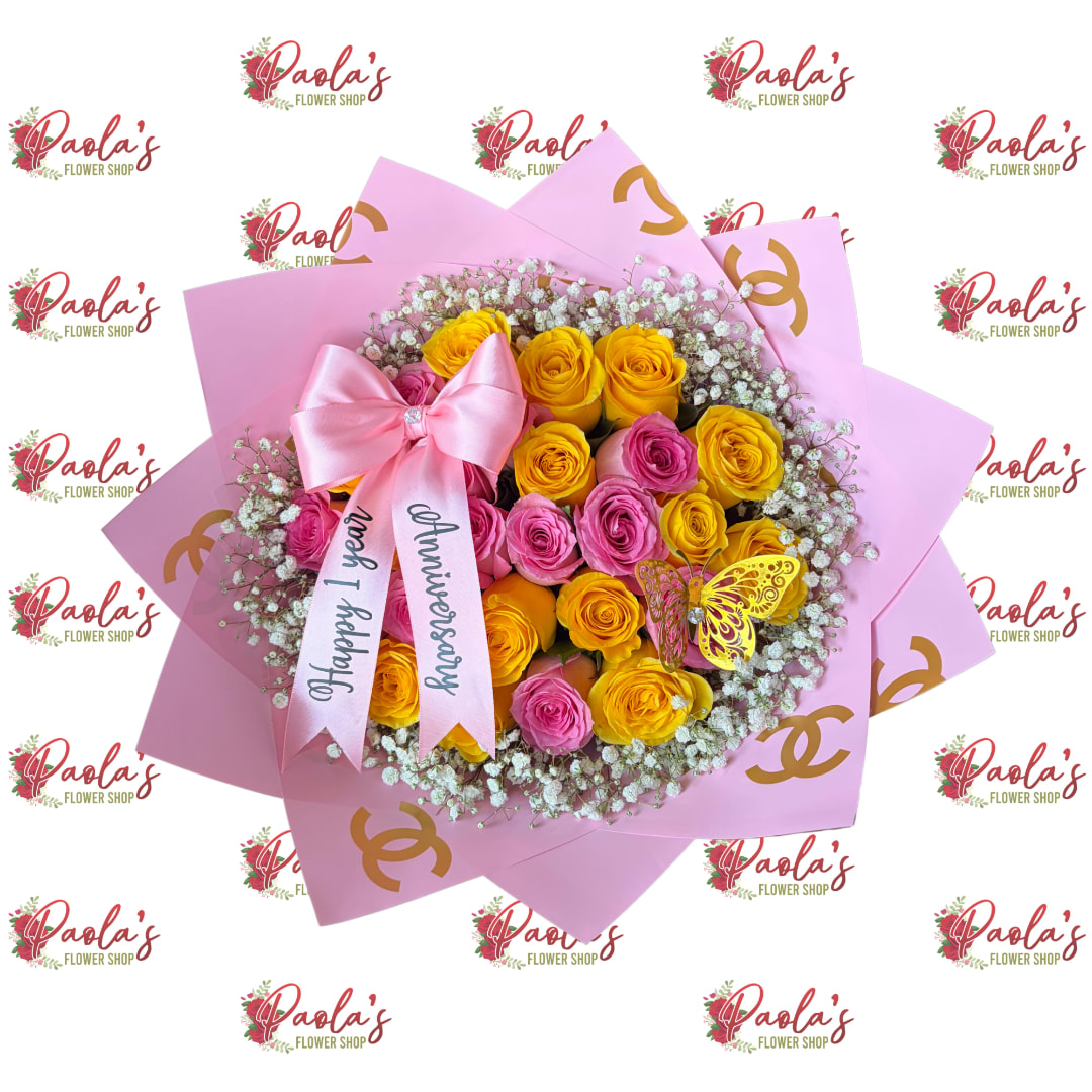 Pink and yellow rose bouquet with a satin bow and anniversary ribbon
