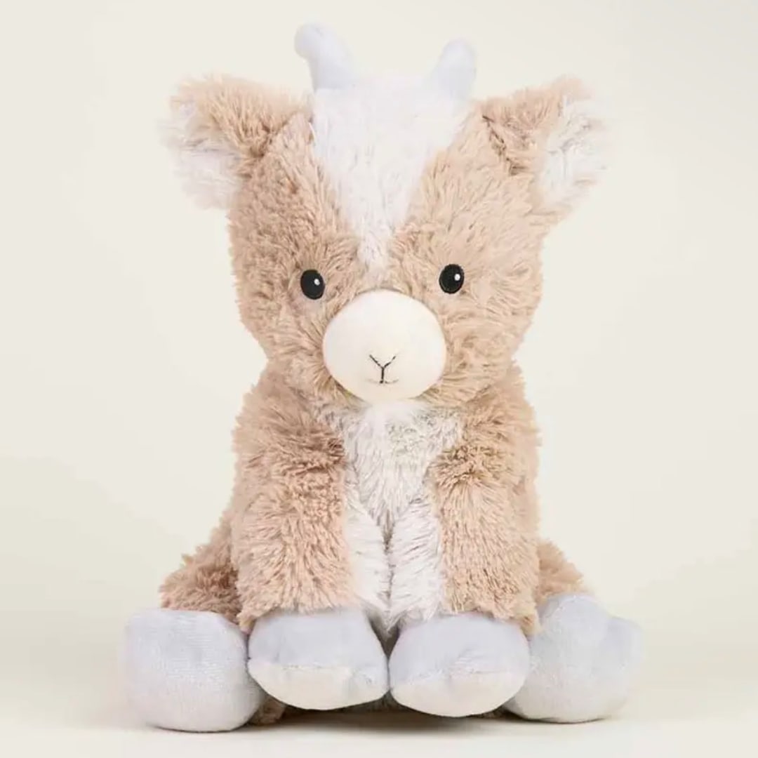 Plush stuffed animal with tan and white fur sitting upright