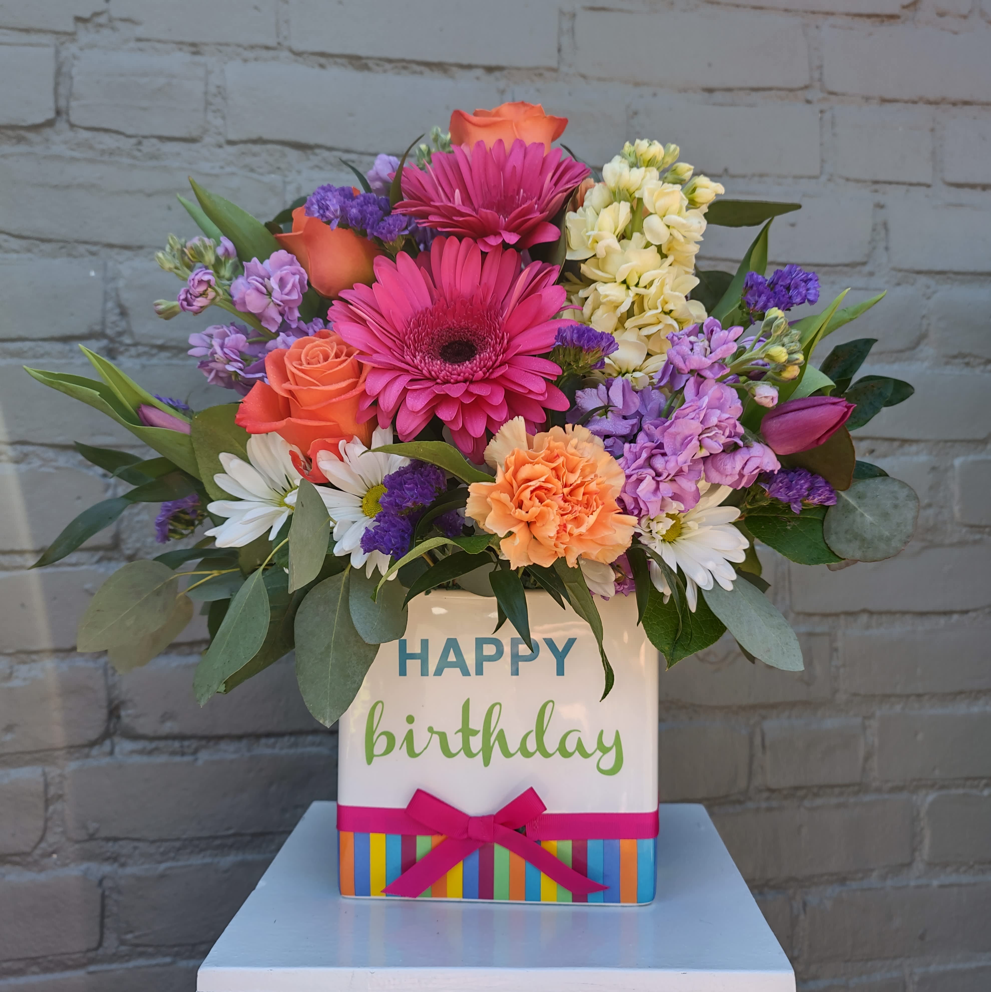 Mixed bouquet in a birthday gift box with roses, gerbera daisies, and carnations